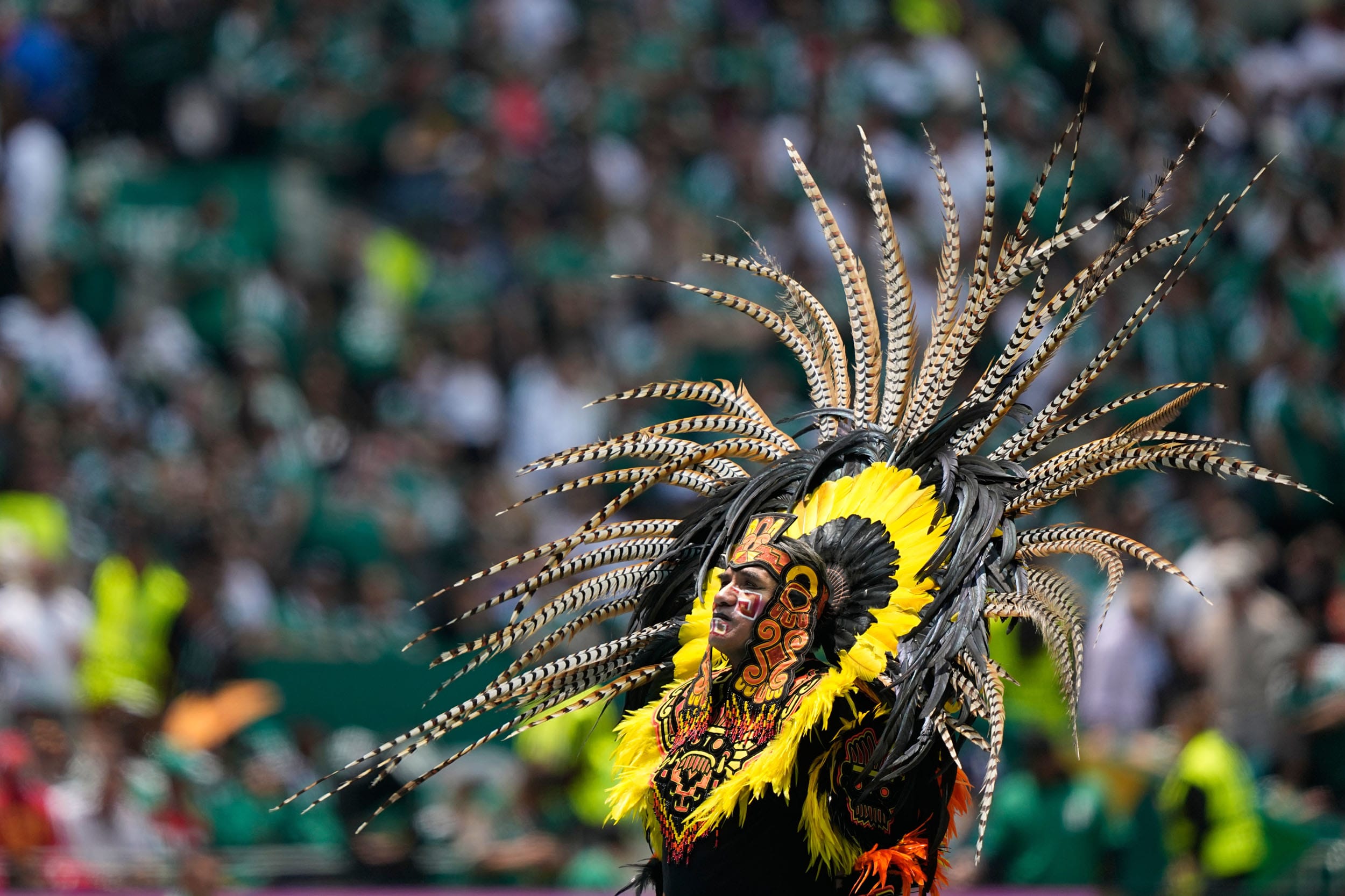 Performers on the pitch during the opening ceremony for the World Cup in Mexico City, Thursday, June 11, 2026.