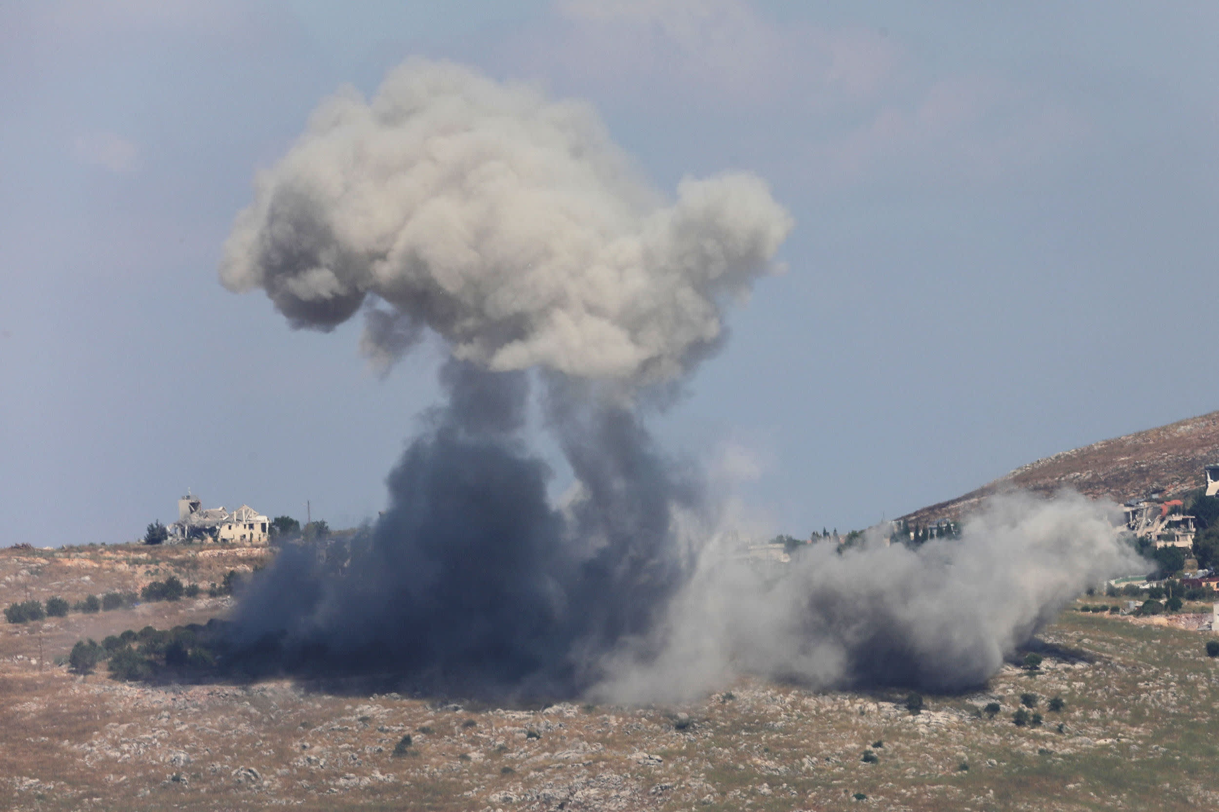 Smoke billows from southern Lebanon following an Israeli strike, as seen from Marjayoun