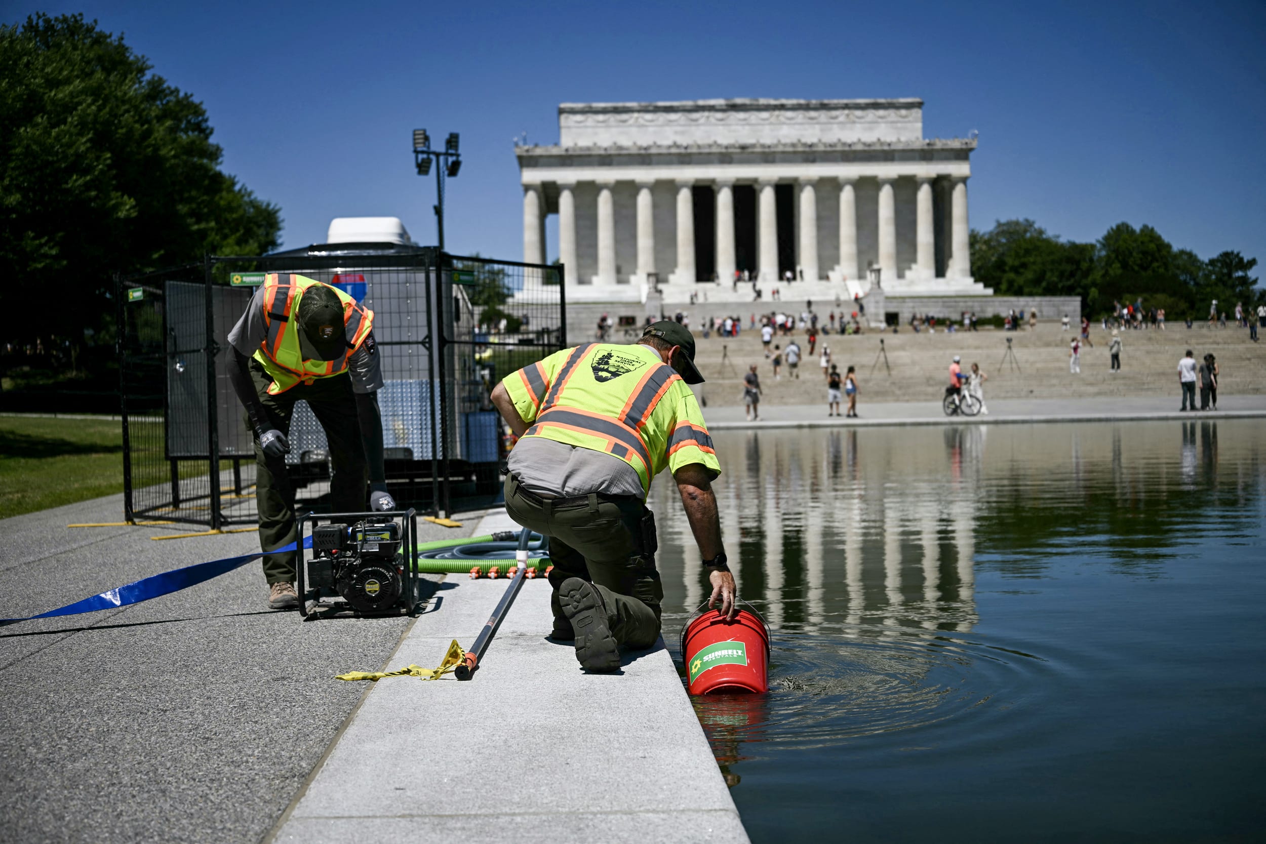 Members of the National Park Service work.
