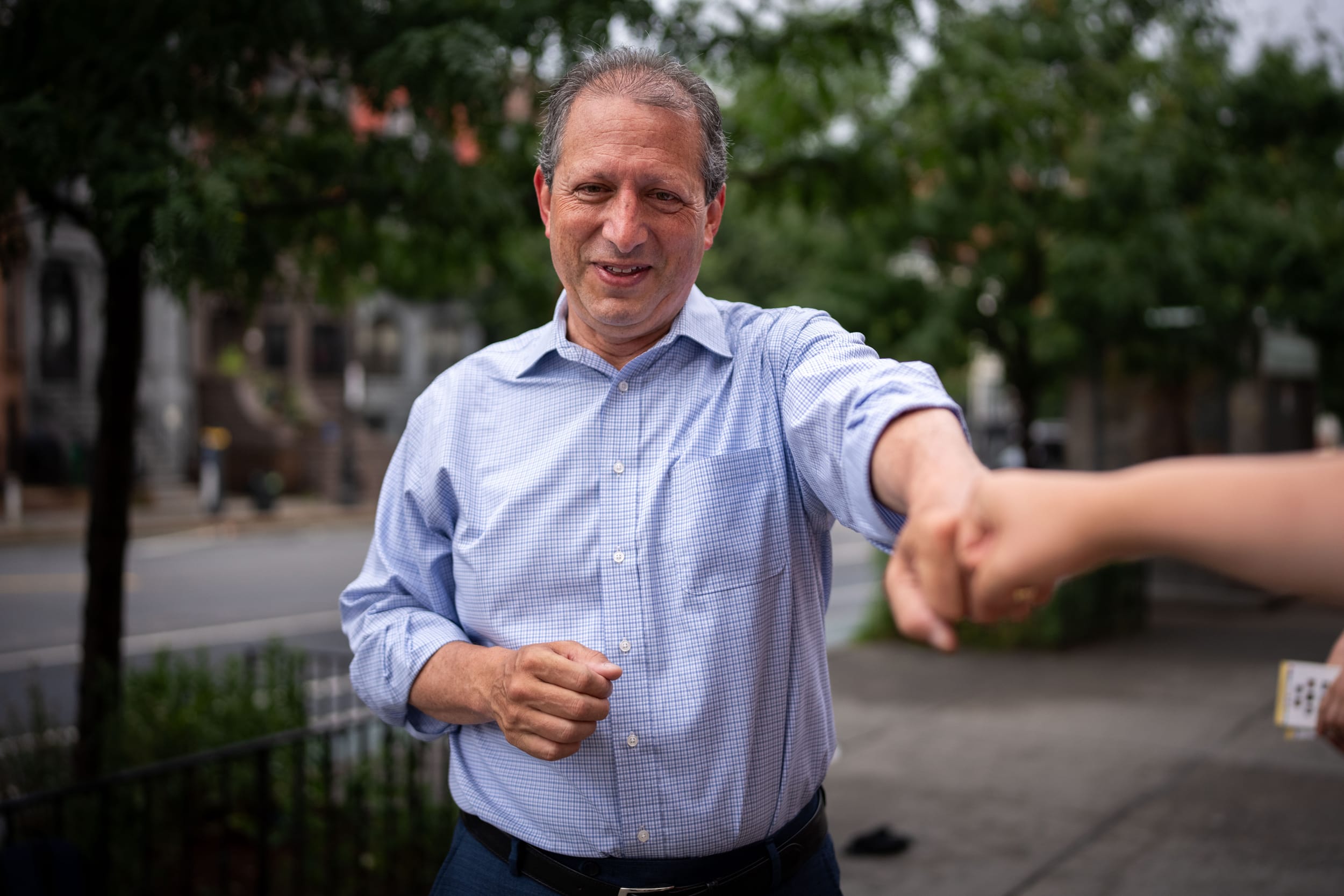 Democratic House candidate Brad Lander greets a voter in Brooklyn on Tuesday, June 23, 2026.