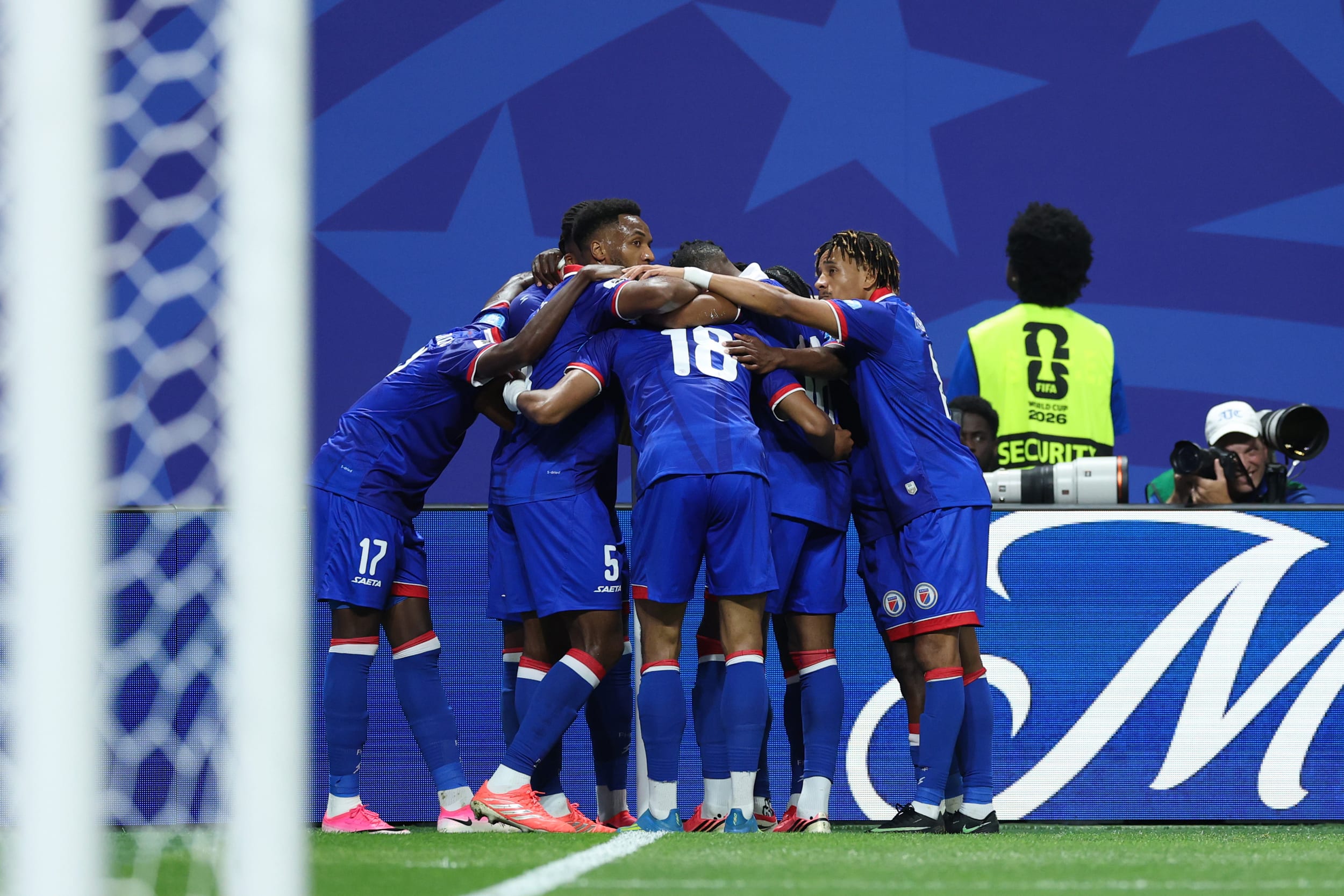 Wilson Isidor #18 of Haiti celebrates with teammates after scoring his team's second goal Morocco v Haiti.