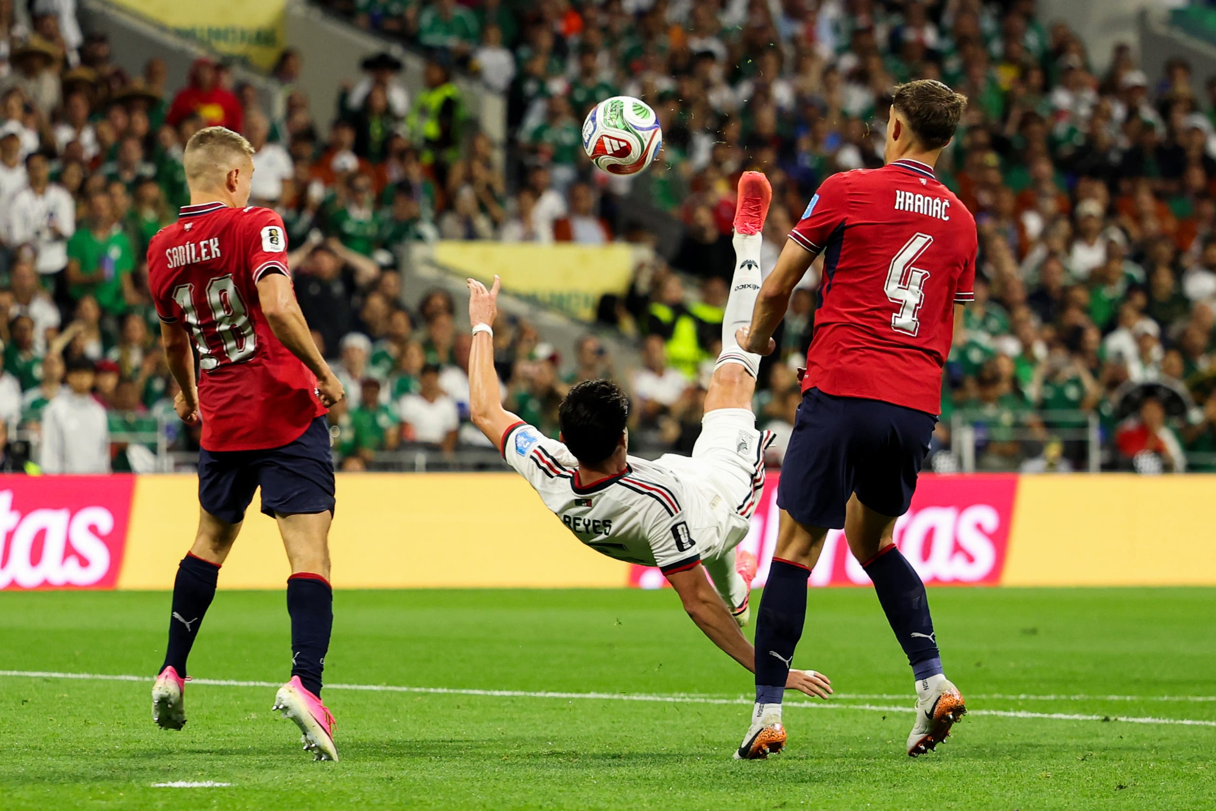 Israel Reyes #15 of Mexico kicks during Czechia v Mexico match.