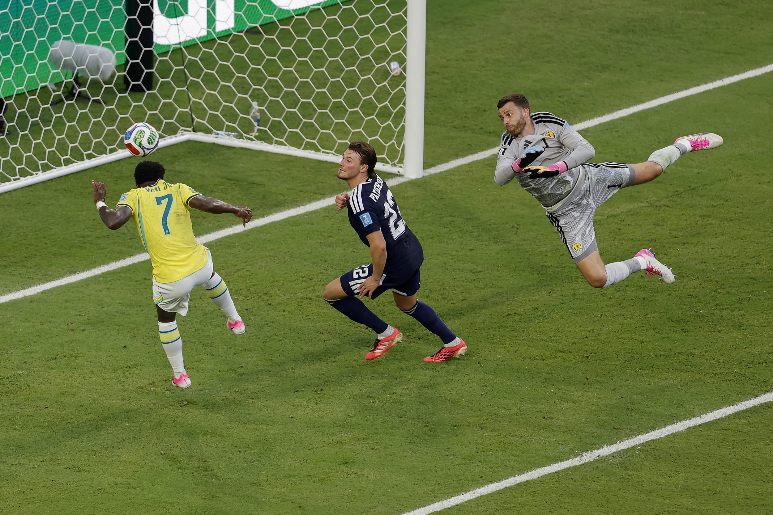 Vinicius Junior #7 of Brazil scores his team's second goal during the Scotland v Brazil match.