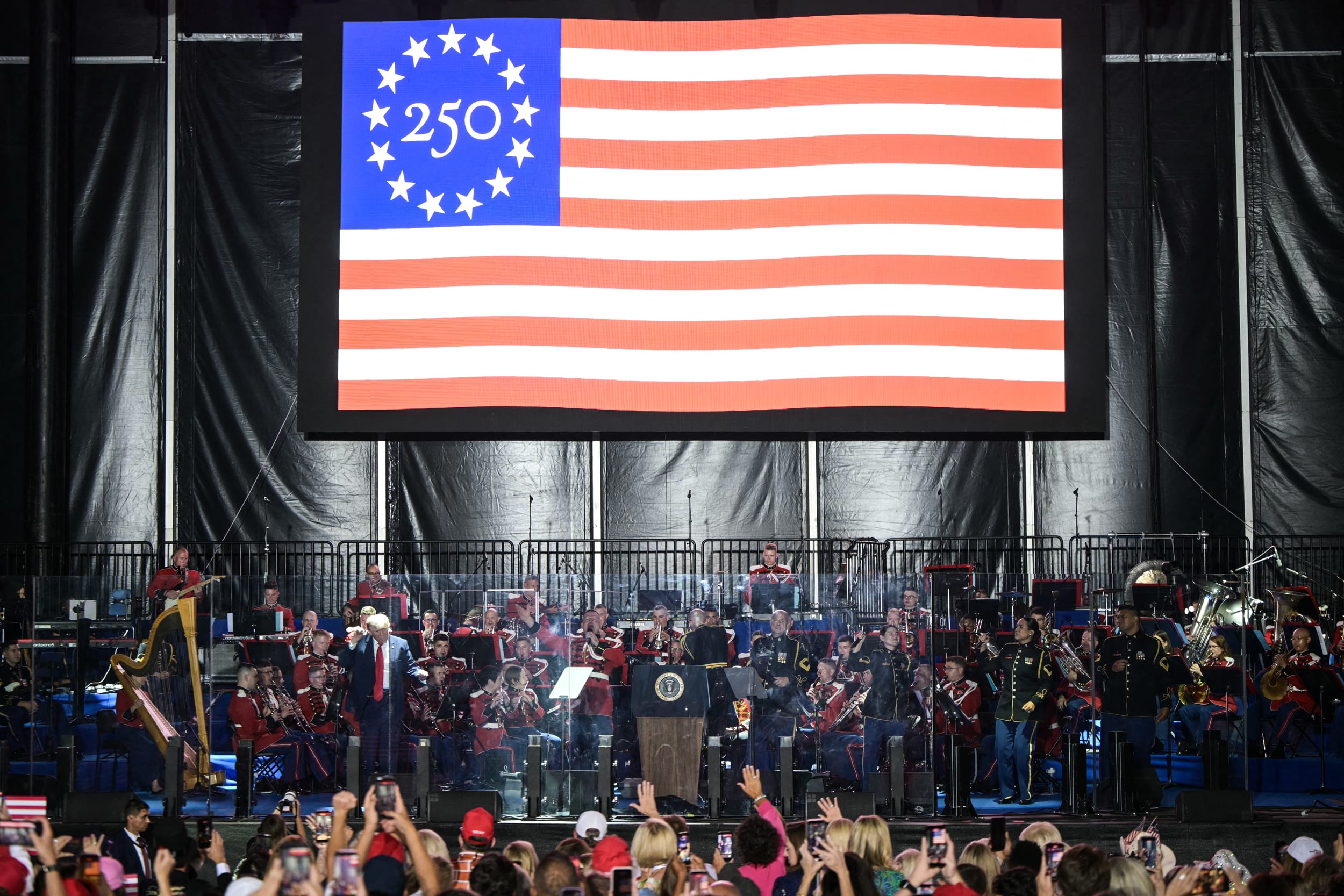 U.S. President Donald Trump dances on stage after speaking during the kick-off celebration for the "Great American State Fair" 