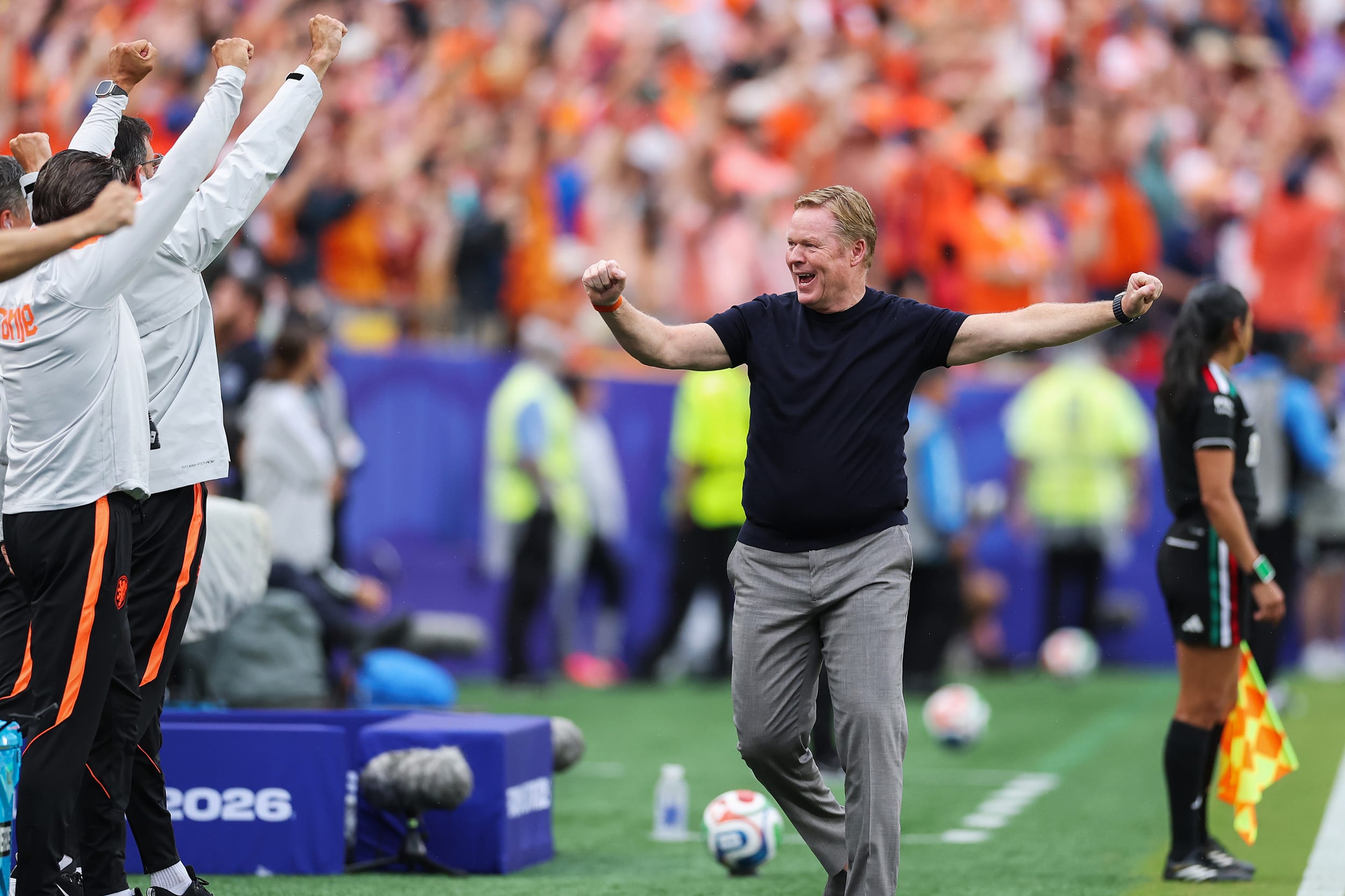 Ronald Koeman, Head Coach of Netherlands, celebrates after the team's second goal.