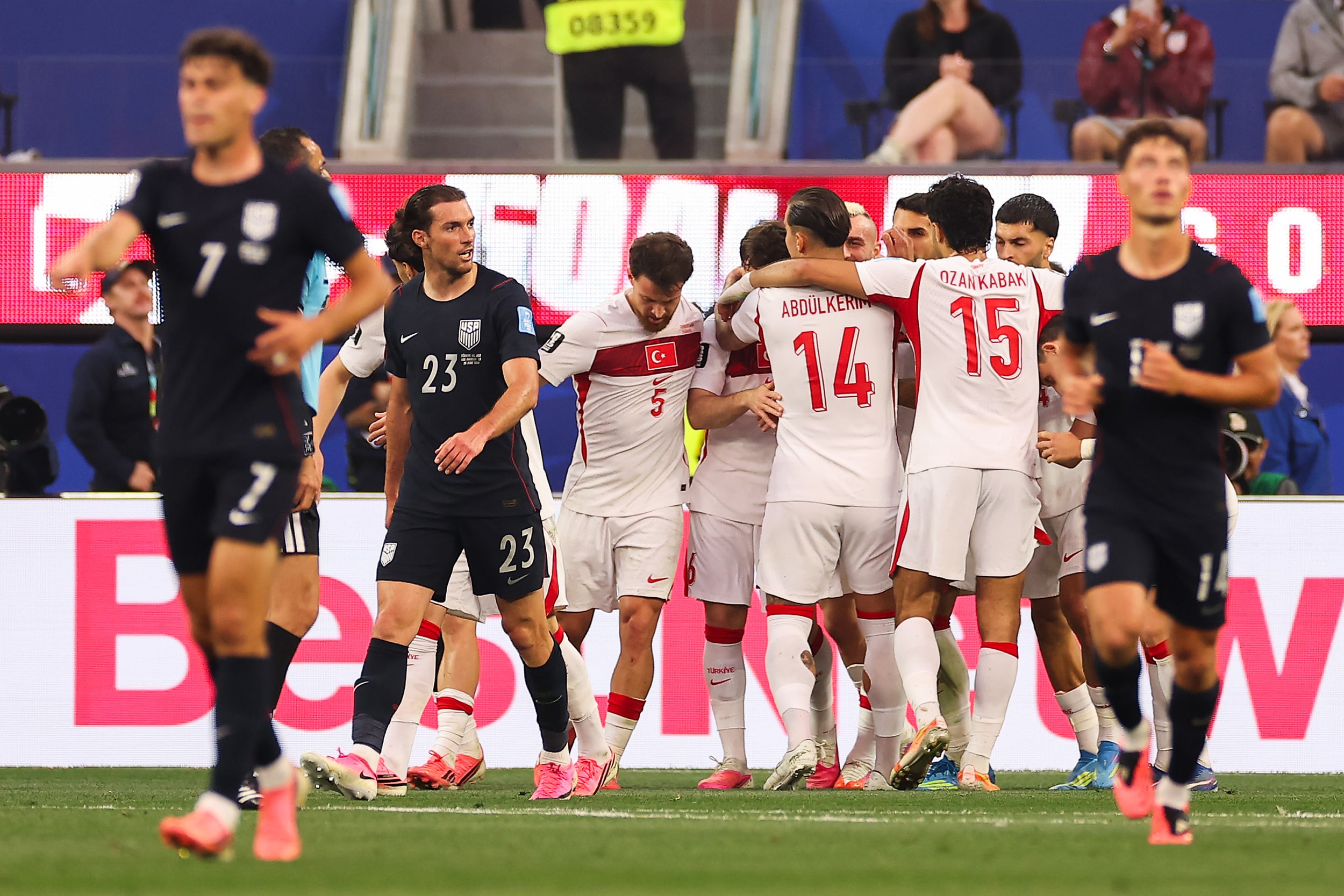 Orkun Kokcu #6 of Turkiye celebrates with teammates after scoring his team's second goal during Türkiye v USA game.