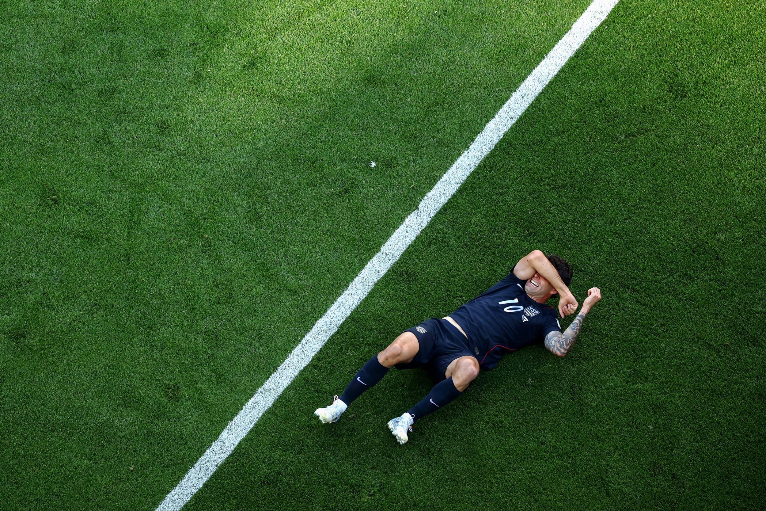 Christian Pulisic #10 of the United States reacts after challenged by Youri Tielemans #8 of Belgium during the USA v Belgium match.