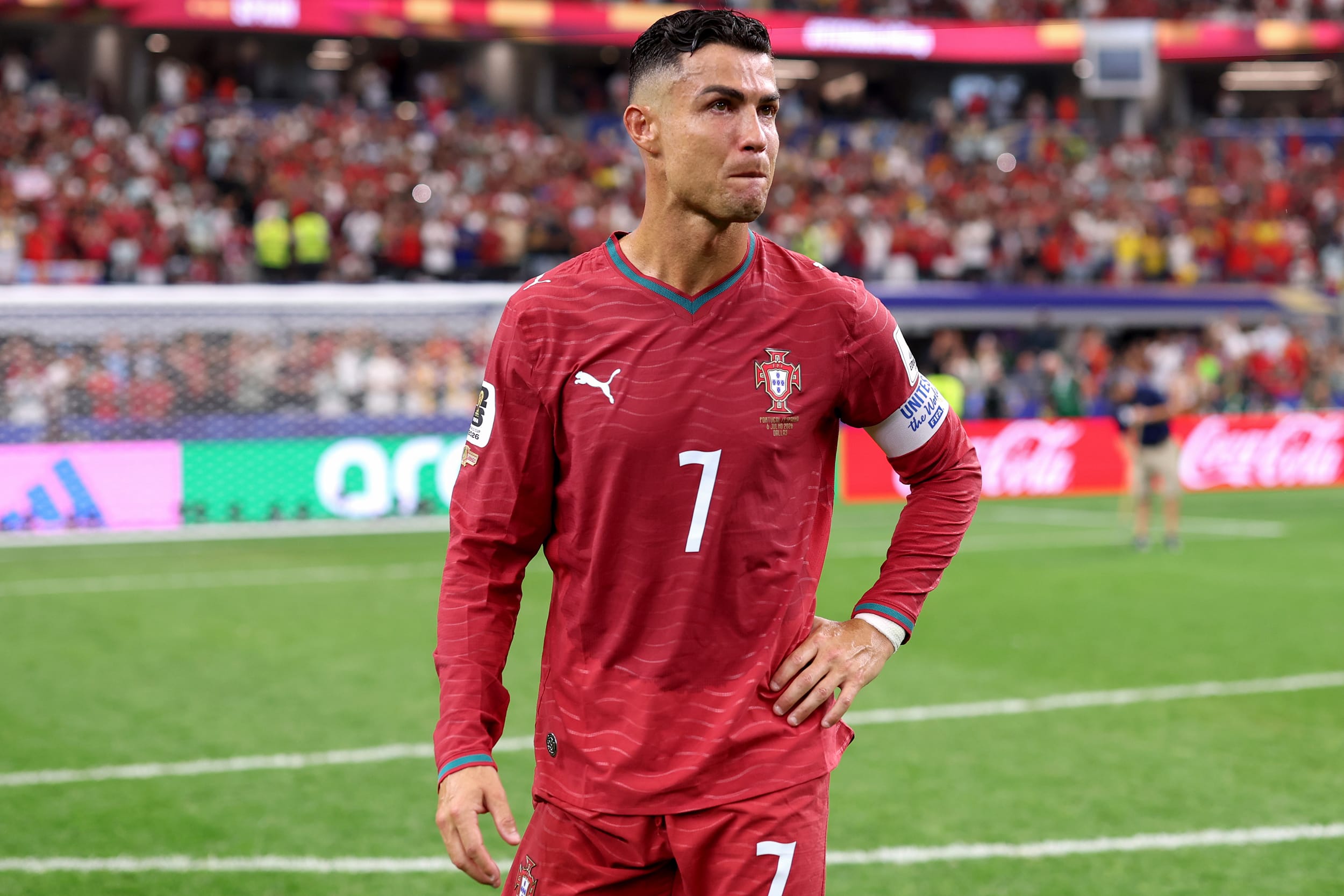 Cristiano Ronaldo #7 of Portugal shows dejection after the team's defeat during the Portugal v Spain: Round of 16 - FIFA World Cup 2026.