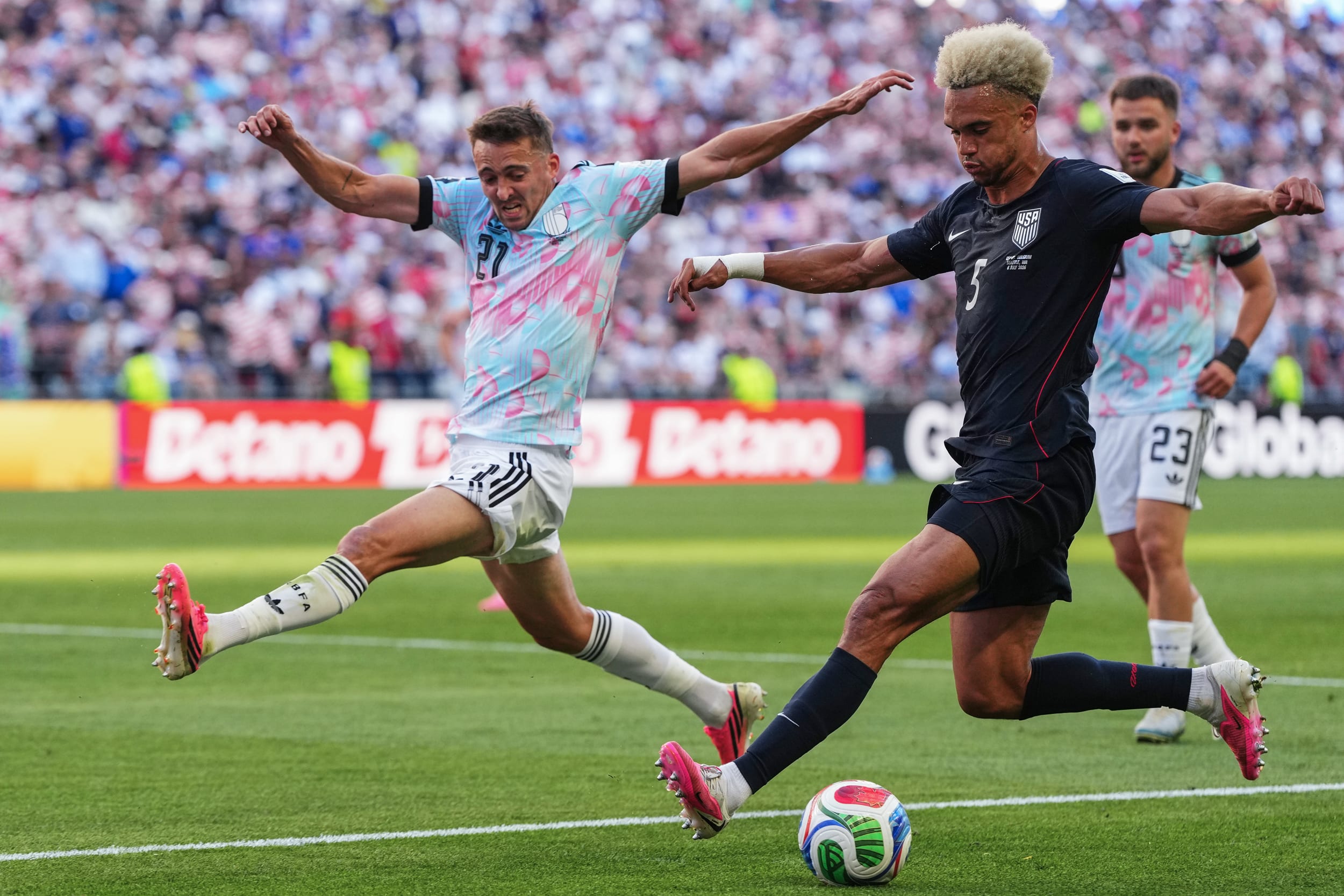 United States' Antonee Robinson, right, and Belgium's Timothy Castagne battle for the ball during the World Cup.