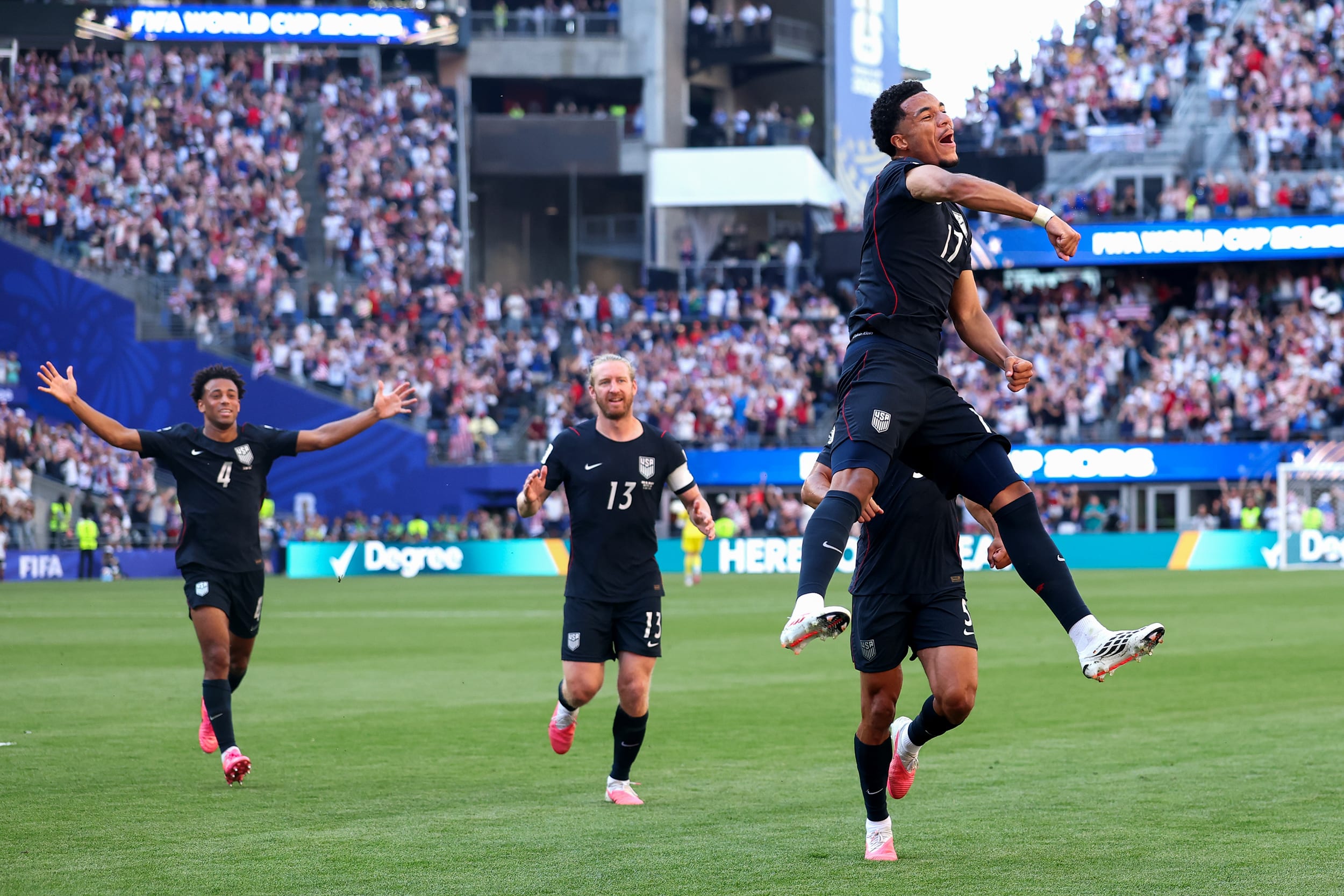 Malik Tillman #17 of the United States celebrates scoring his team's first goal during the USA v Belgium game.