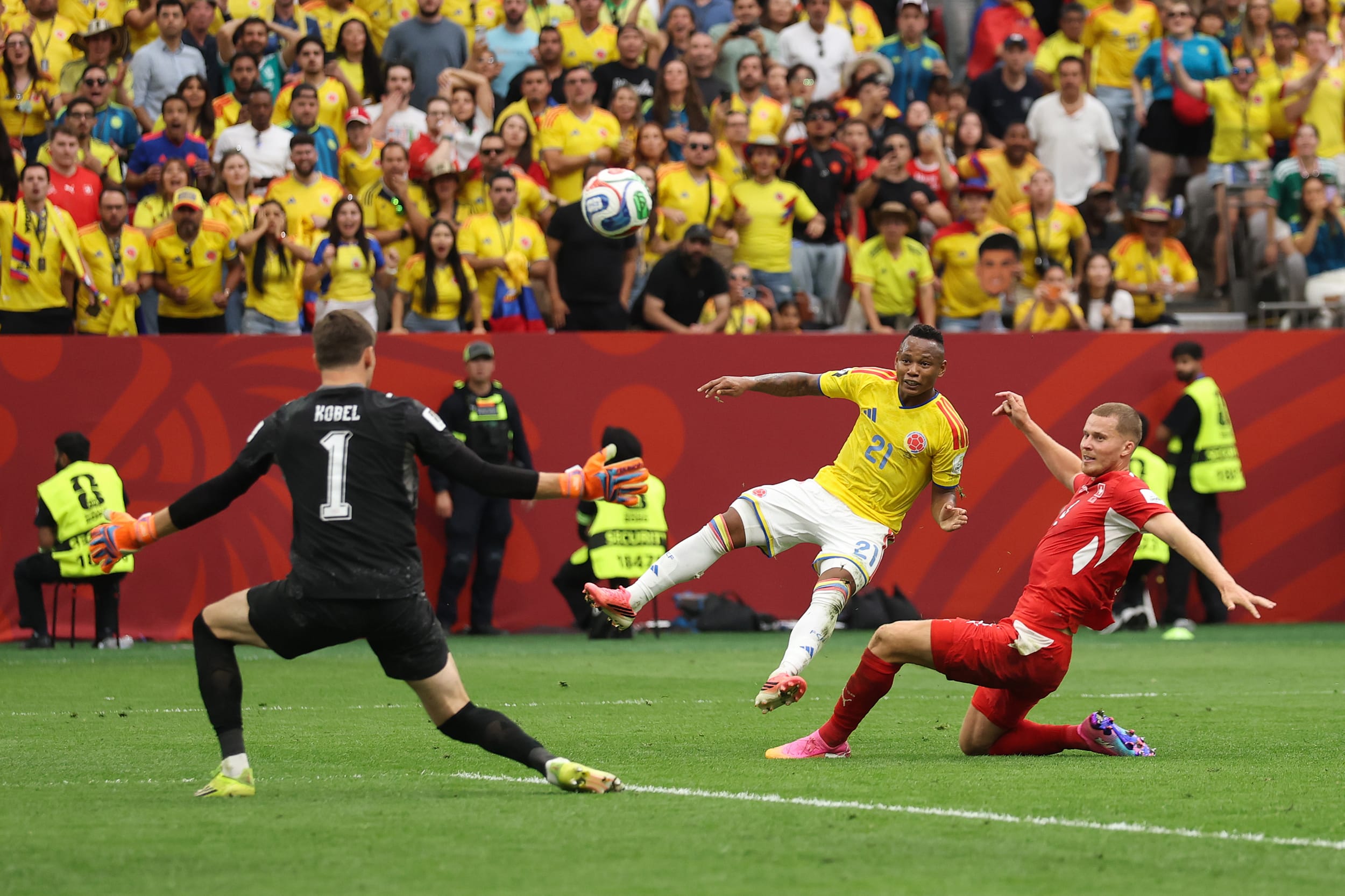 Leandro Campaz #21 of Colombia shoots and misses a chance against Gregor Kobel #1 of Switzerland during the Switzerland v Colombia match.