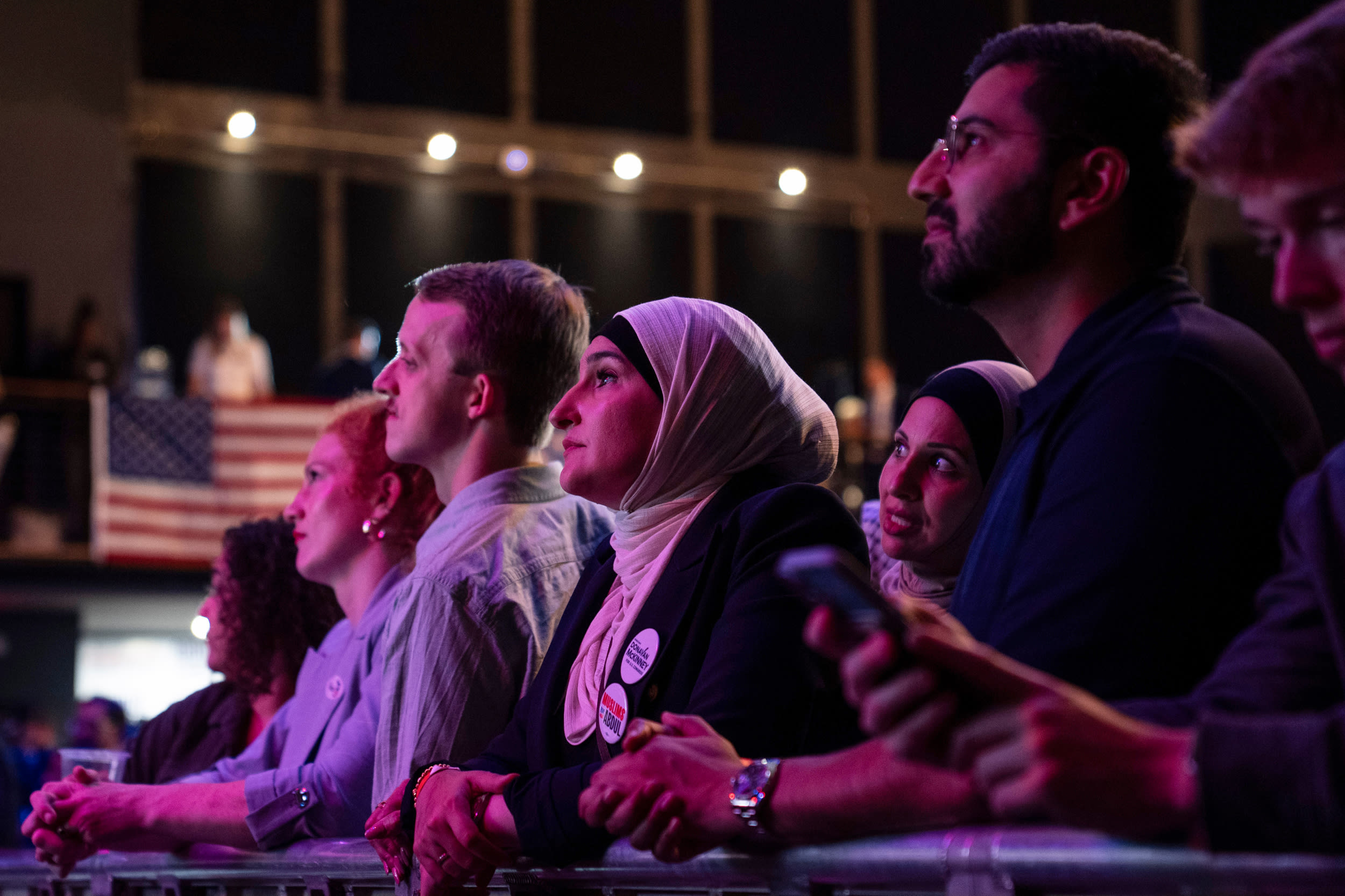 Attendees watch vote results coming in during a primary election night watch party with Abdul El-Sayed in Michigan.