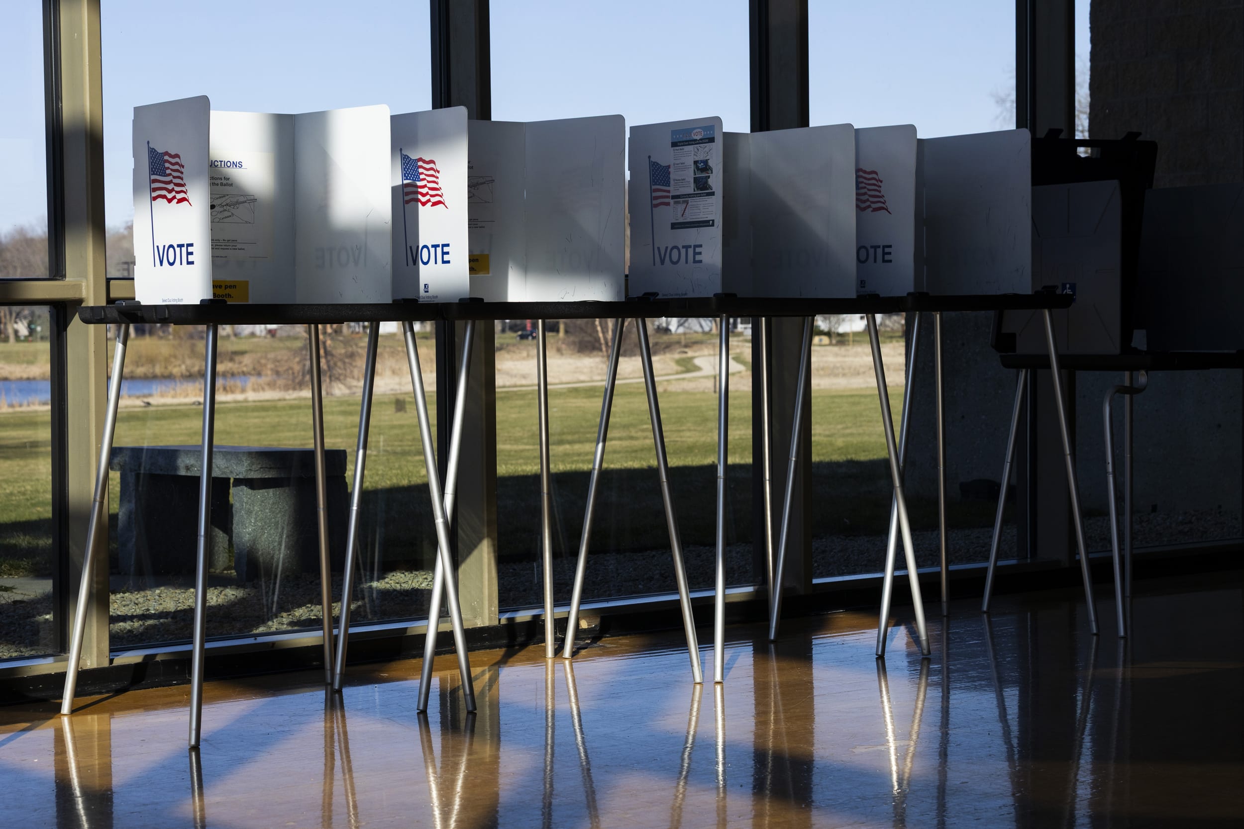 Ballot booths by the window.