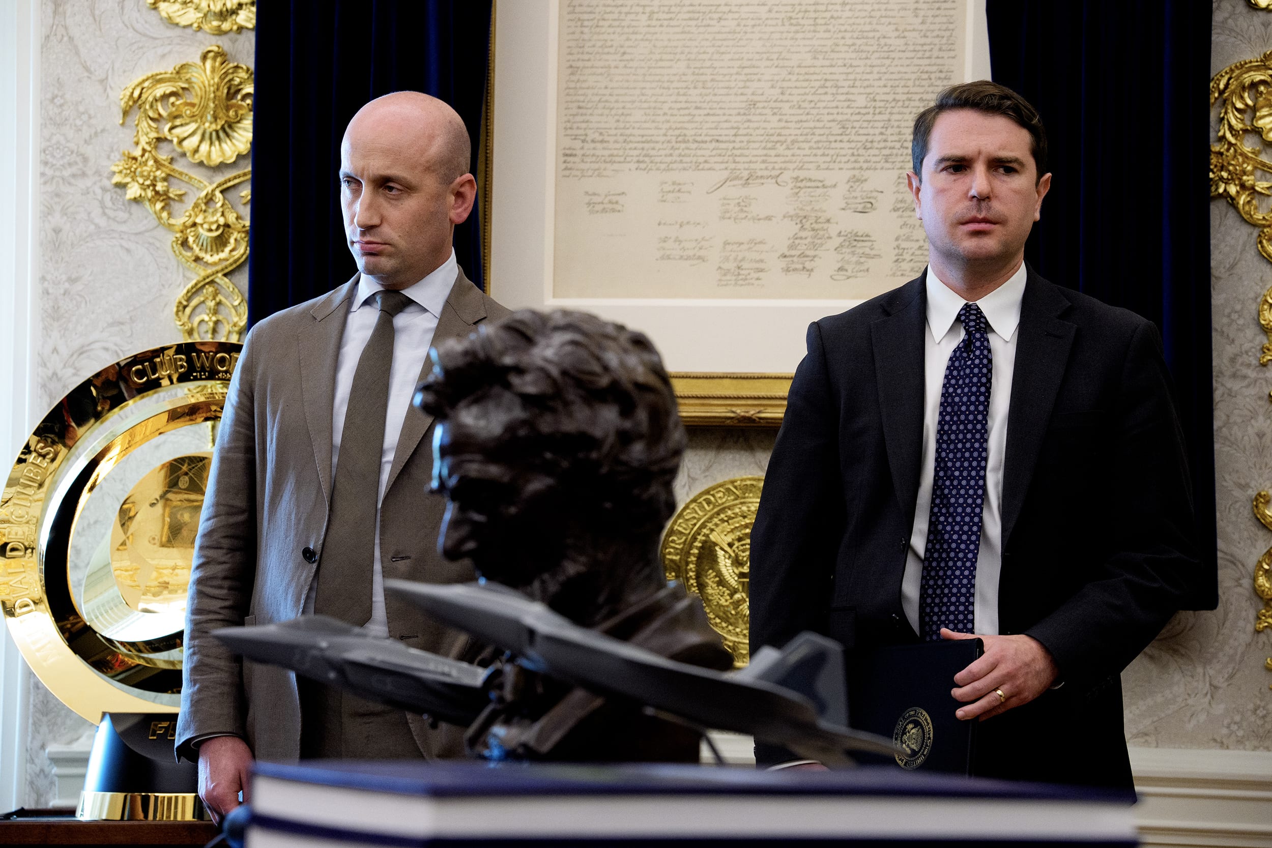 Stephen Miller and Ben Moss standing in the Oval Office.