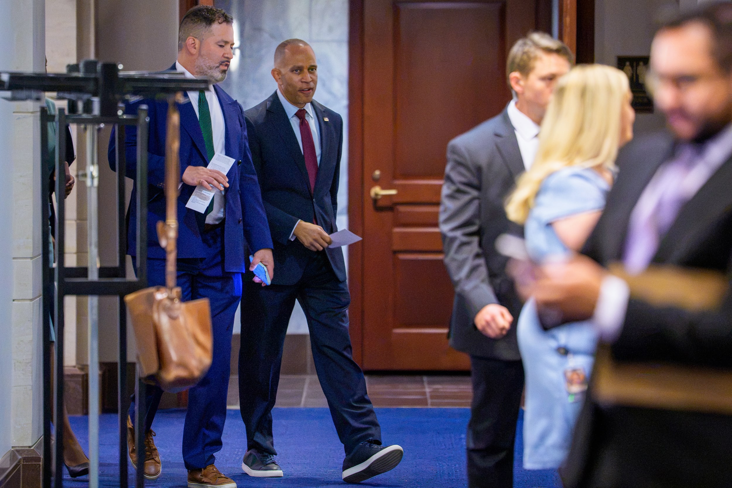 House Minority Leader Hakeem Jeffries, D-N.Y., center.