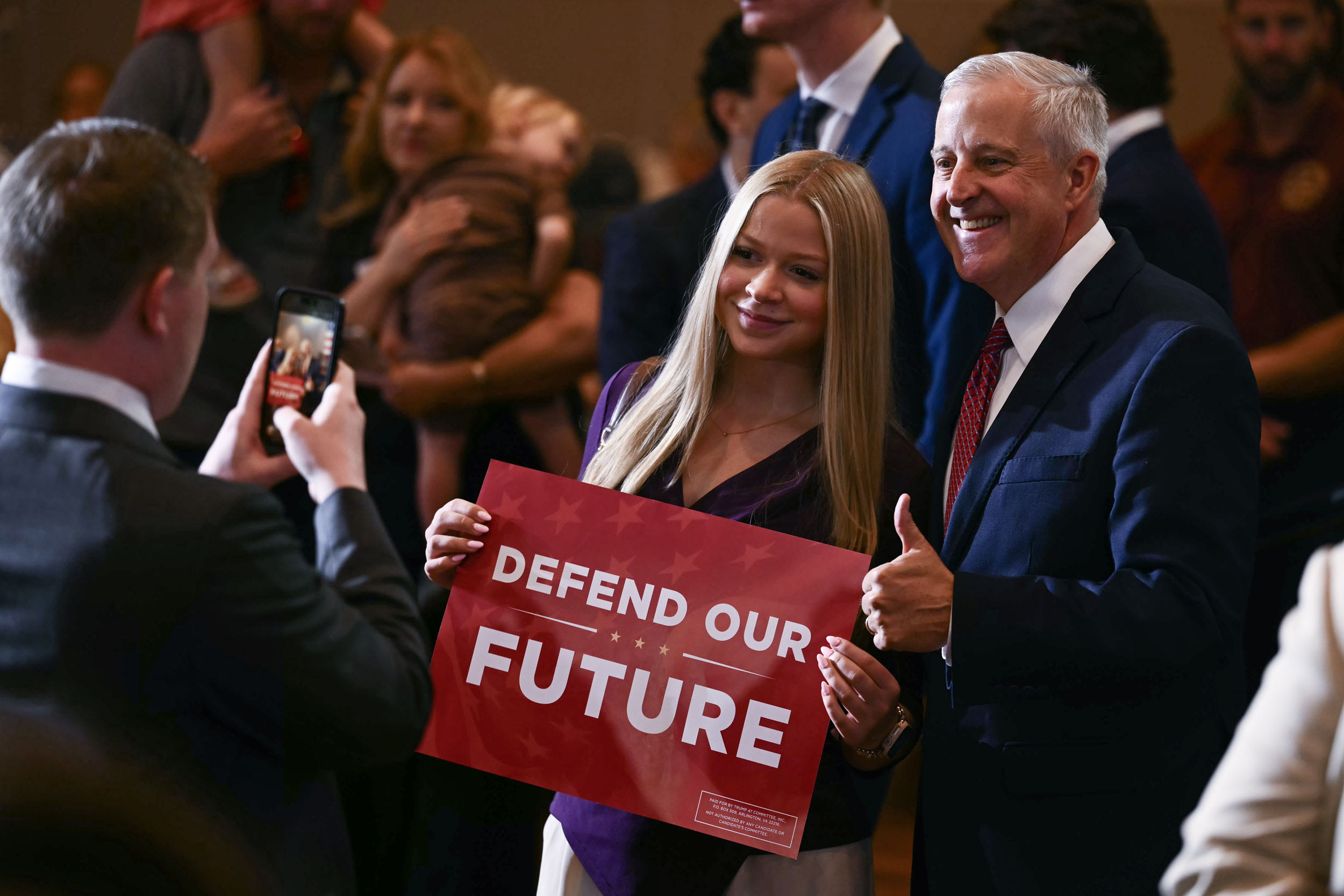 Republican Senate candidate Michael Whatley poses with an attendee before remarks by Vice President JD Vance on Sept. 21, 2026 in Greensboro, N.C.