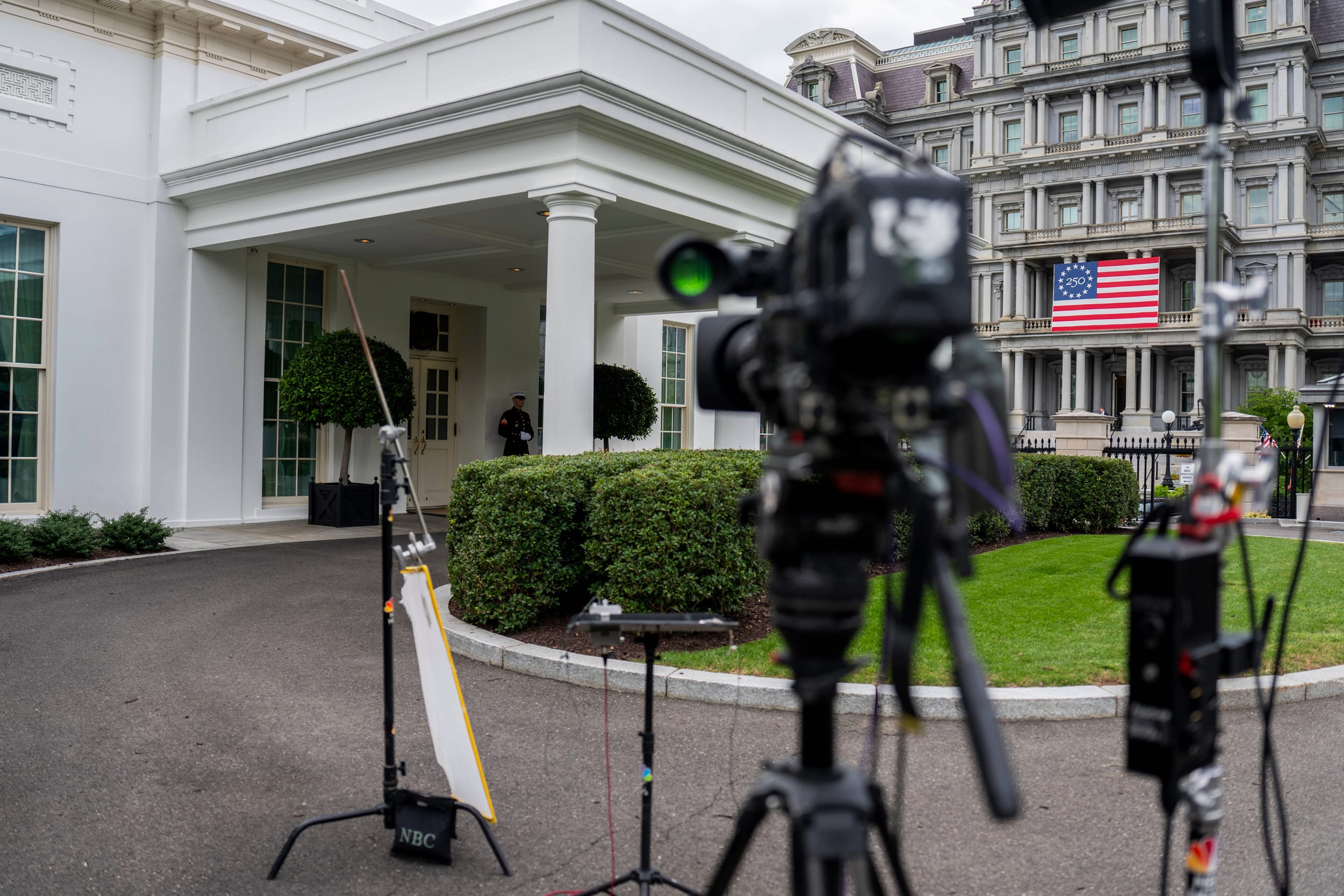 A television camera outside the West Wing of the White House
