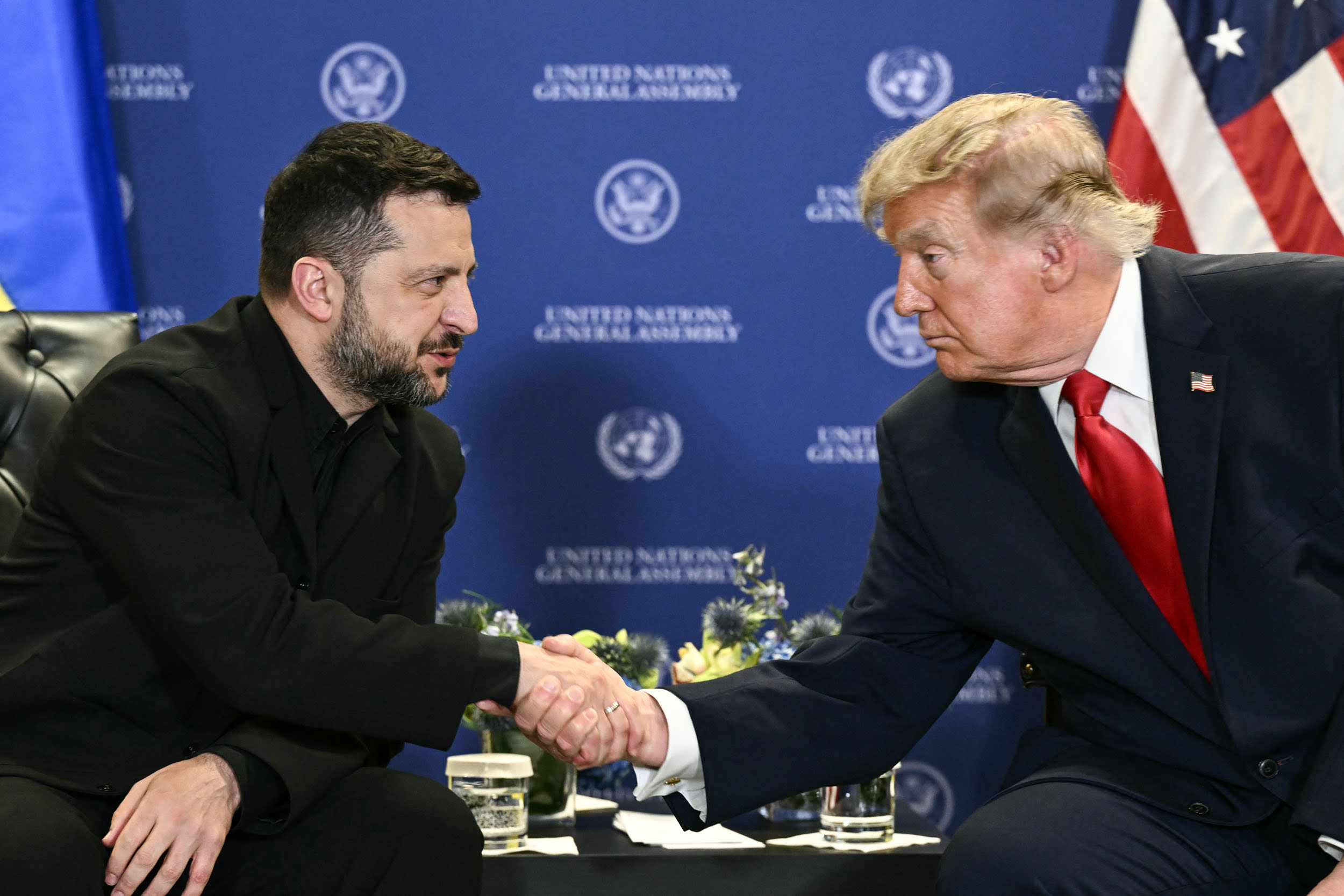 President Donald Trump shakes hands Ukraine's President Volodymyr Zelensky