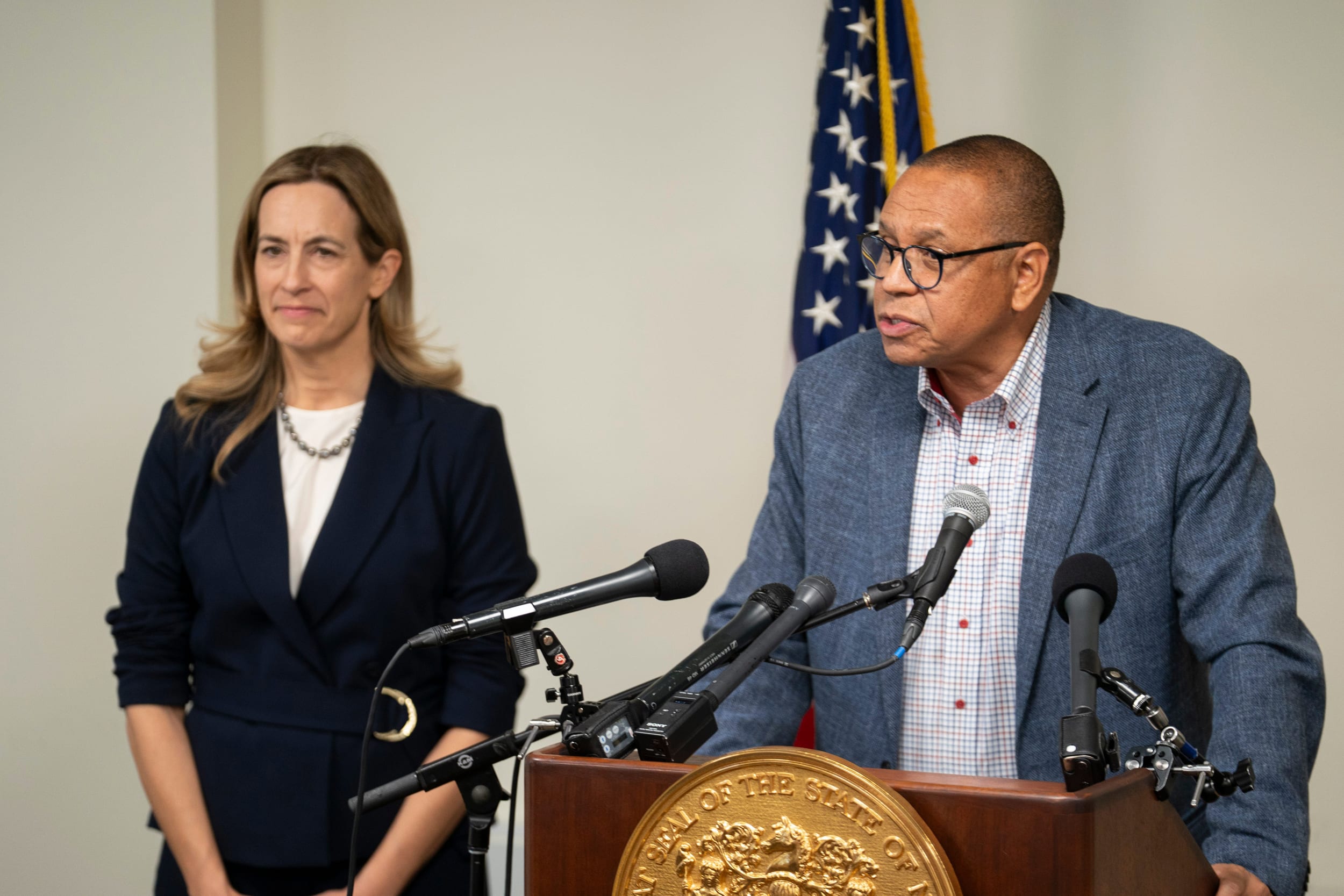 Lt. Governor-elect Dale Caldwell speaks, right, and Governor-elect Mikie Sherrill stands on the left.