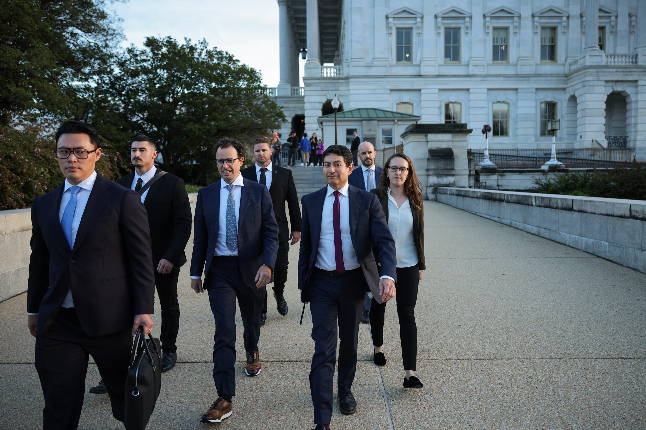 Anthropic CEO Dario Amodei, center, leaving the U.S. Capitol.