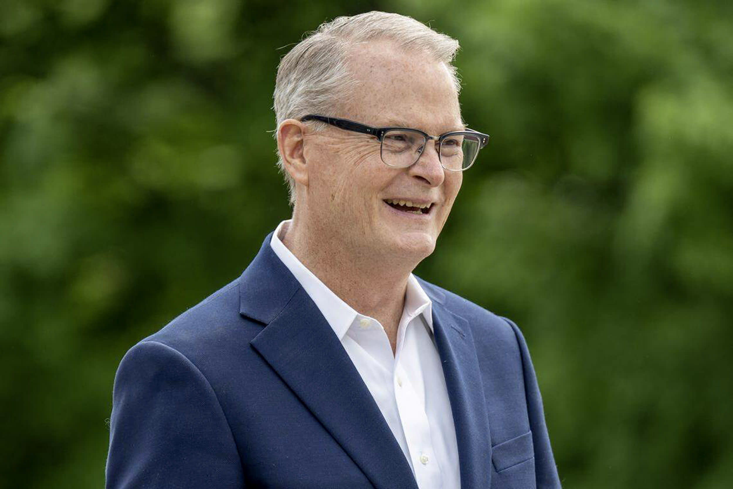 Adam Hamilton smiles while standing outdoors. 