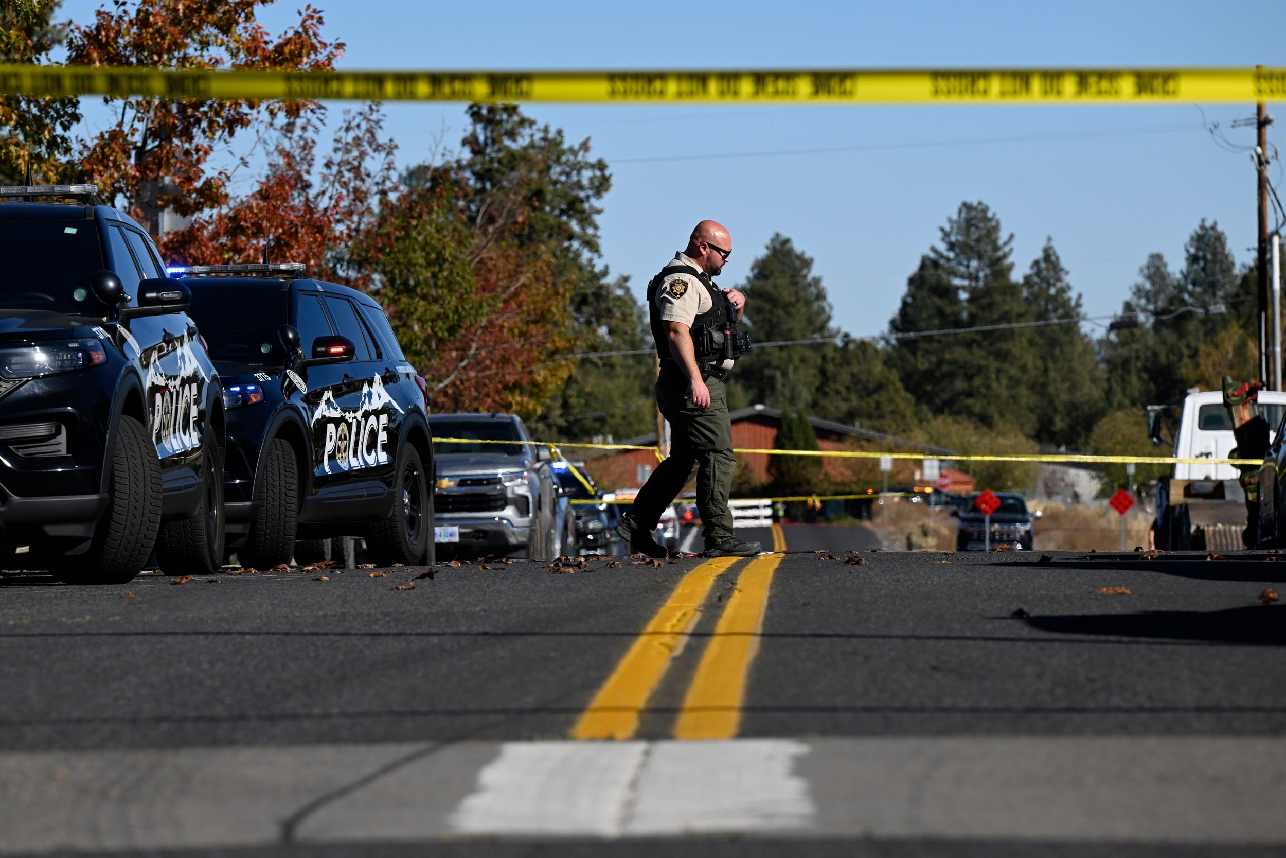 A sheriff's deputy walks outside Silver Rail Elementary school,