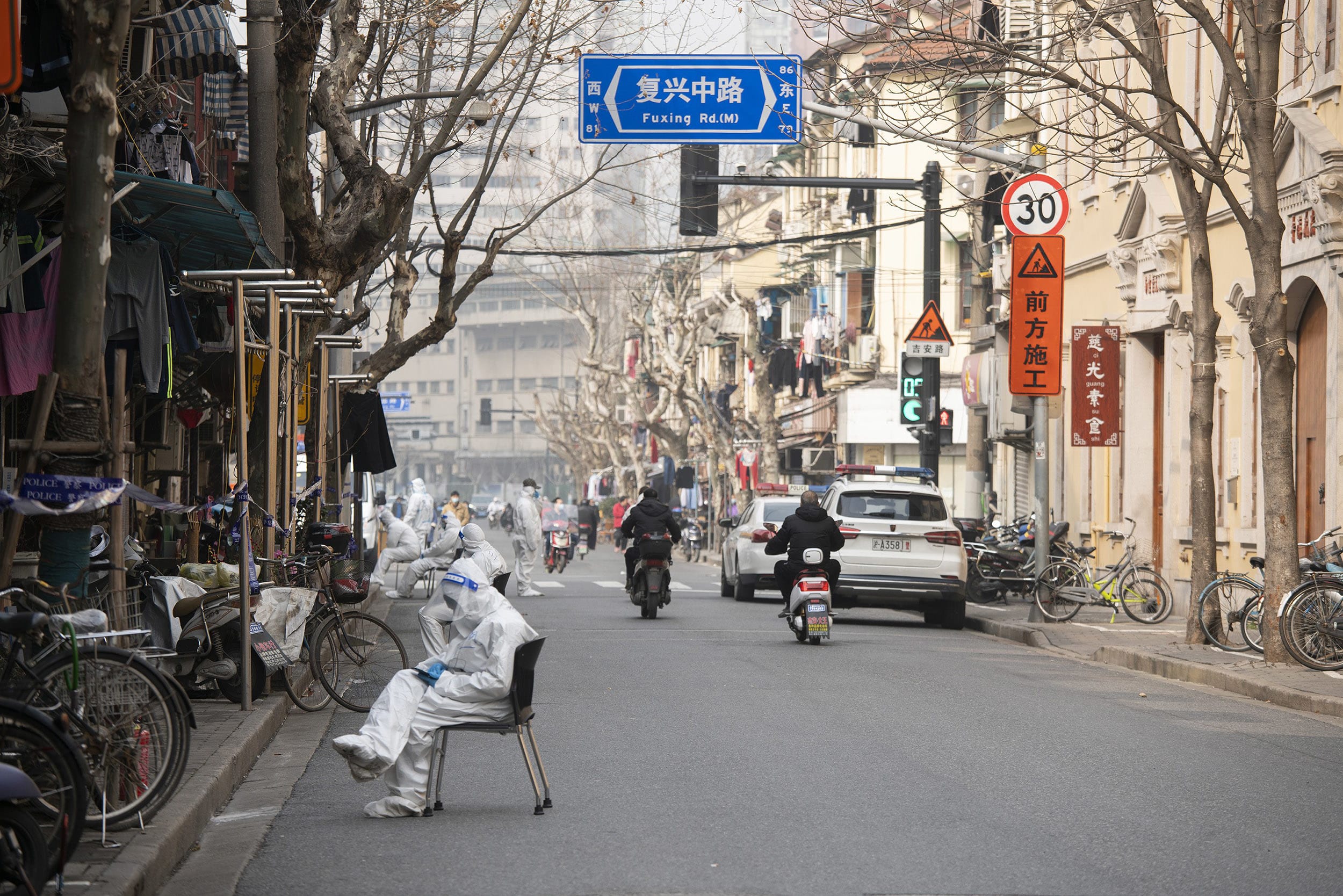 Image: Health workers in protective suits are seen in the Huangpu district on Jan. 28, 2021 in Shanghai, China.