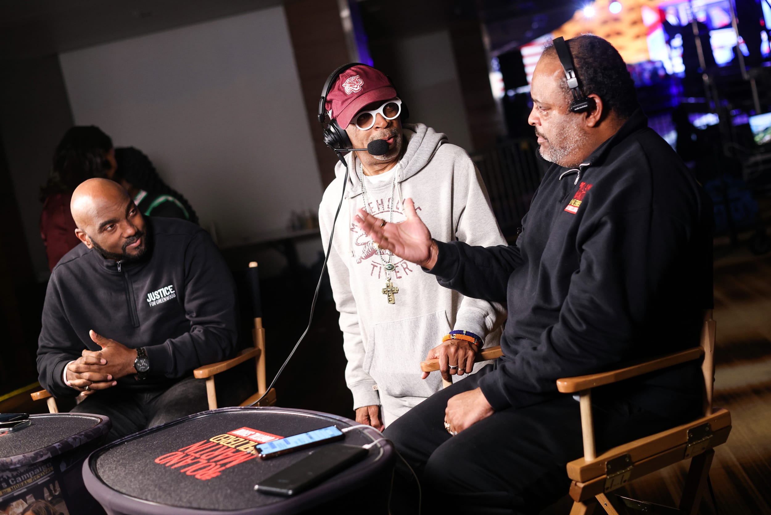 Spike Lee talks with Roland Martin, right, during an election night watch party for Sen. Raphael Warnock, D-Ga., on Dec. 6, 2022, in Atlanta.