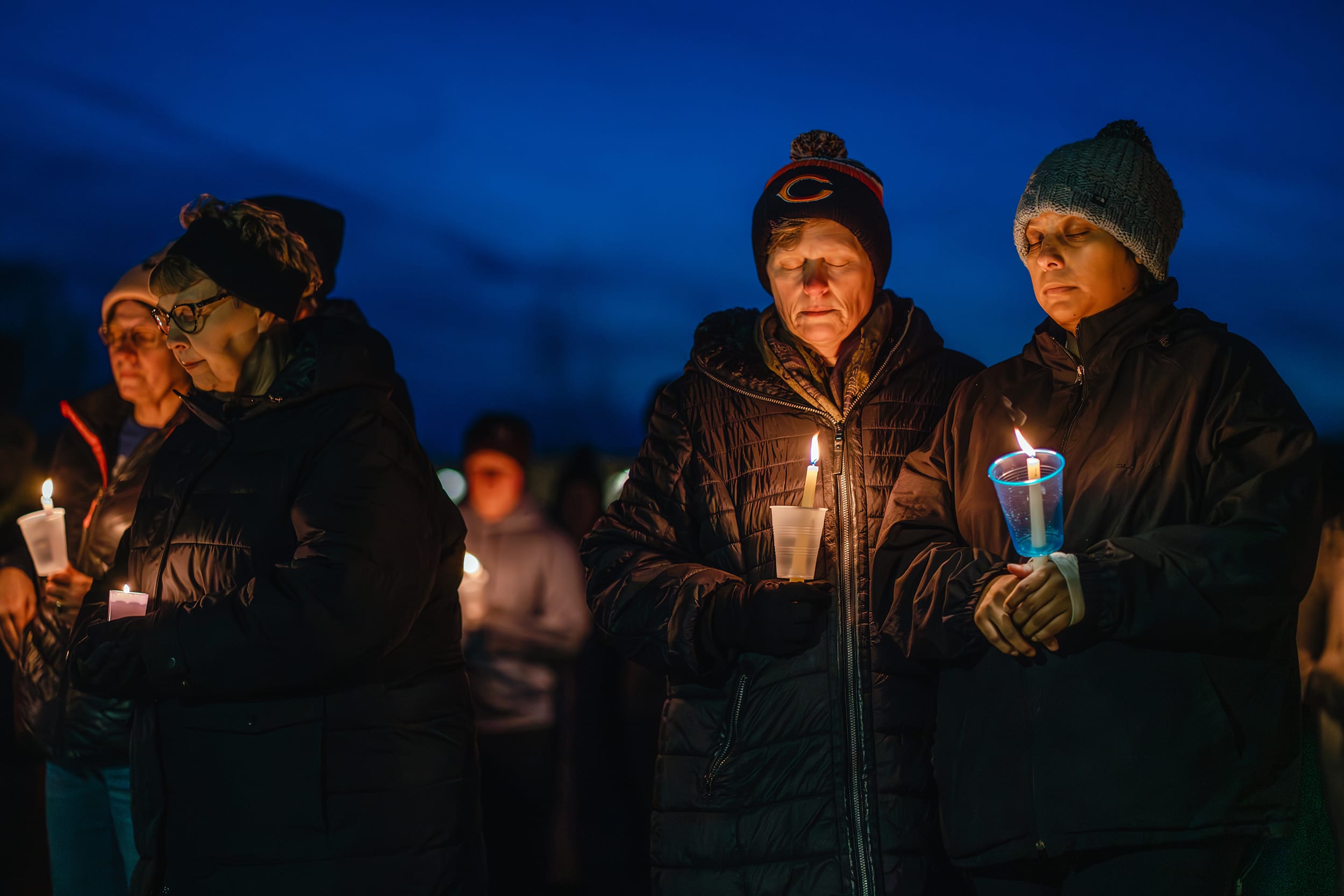 school shooting perry iowa mourners pray vigil candlelight