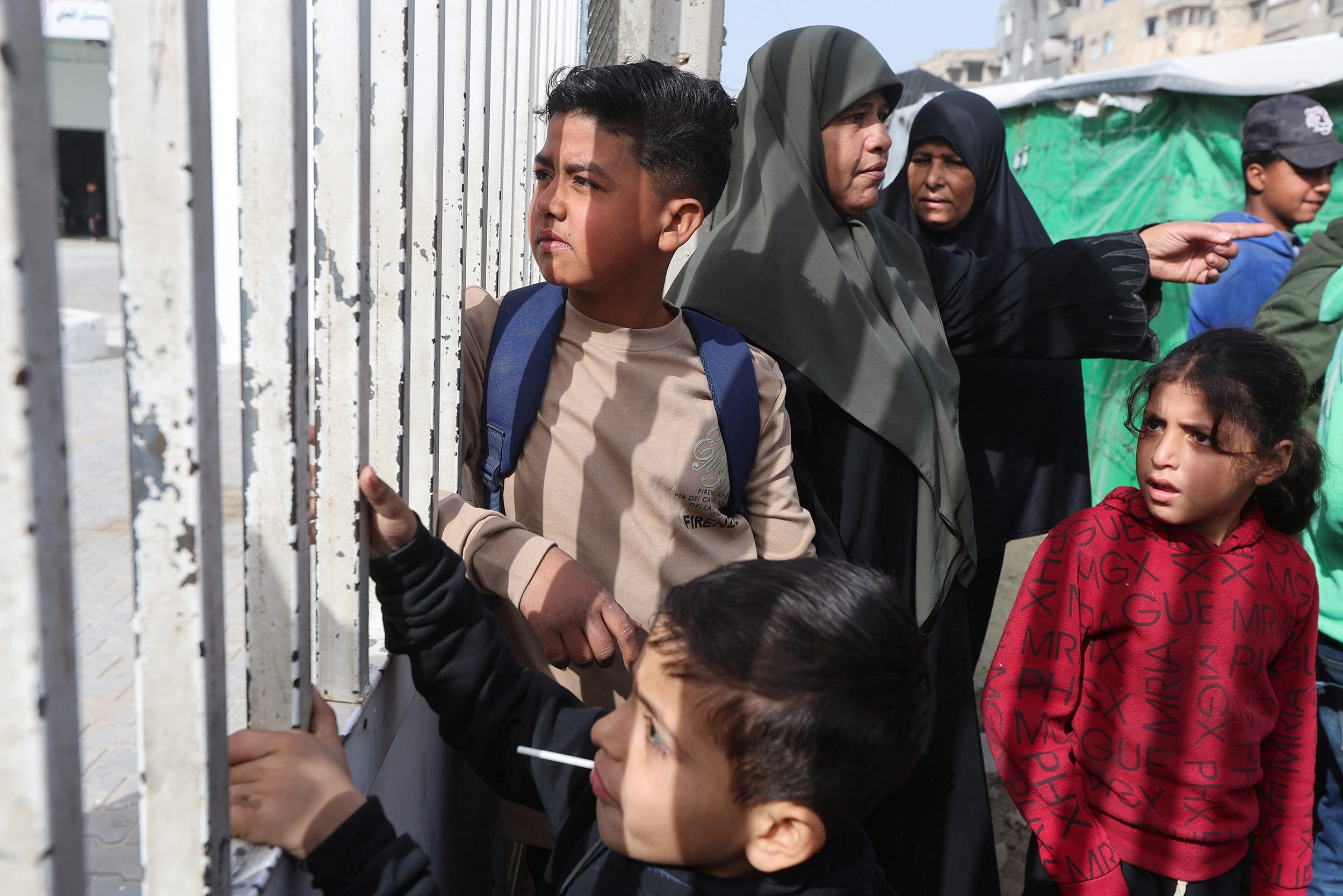 Palestinian patients, wait to leave Gaza for treatment abroad through the Rafah border crossing, in Khan Younis