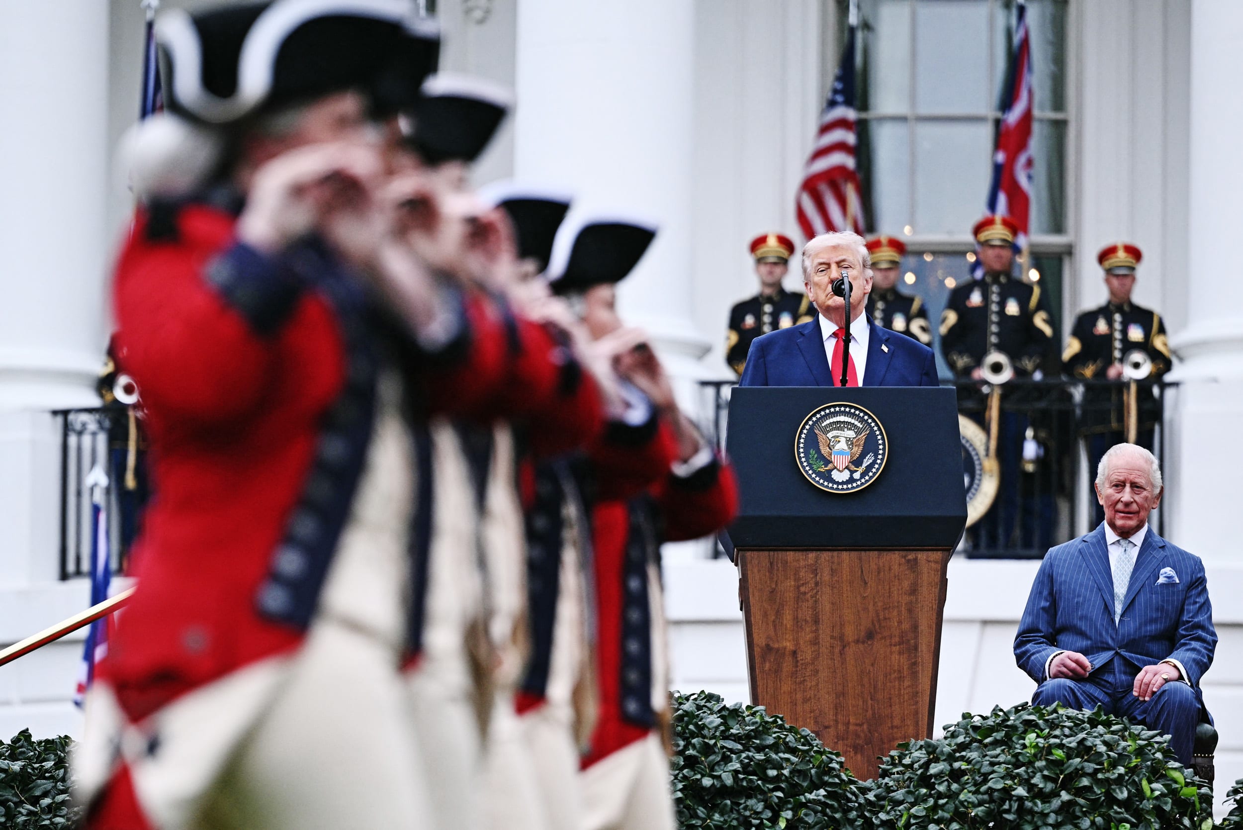 President Donald Trump speaks next to Britain's King Charles III during an arrival ceremony on the South Lawn of the White House in Washington, DC, on April 28, 2026. 