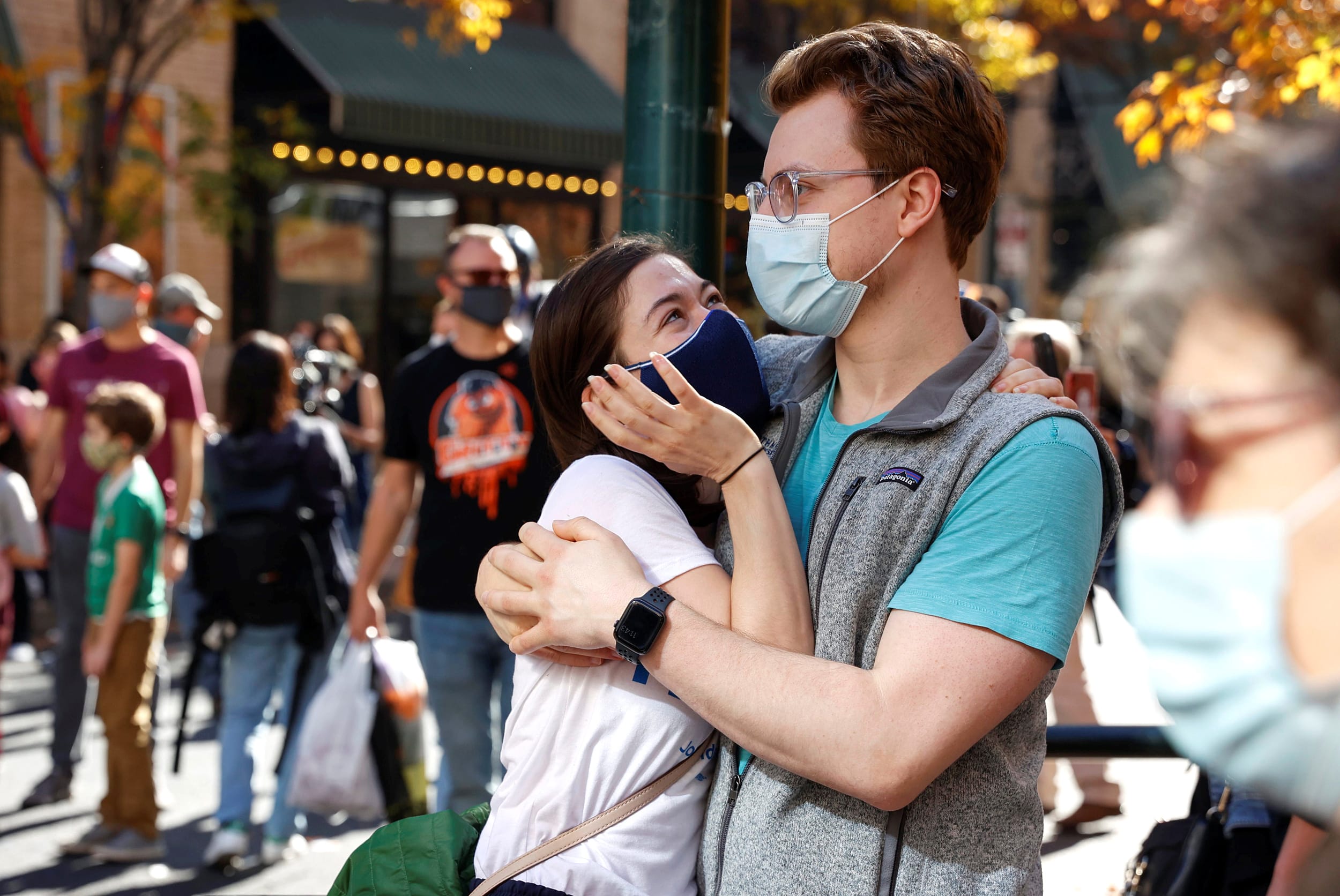 Image: People react as media announce that Democratic U.S. presidential nominee Joe Biden has won the 2020 U.S. presidential election, in, Philadelphia