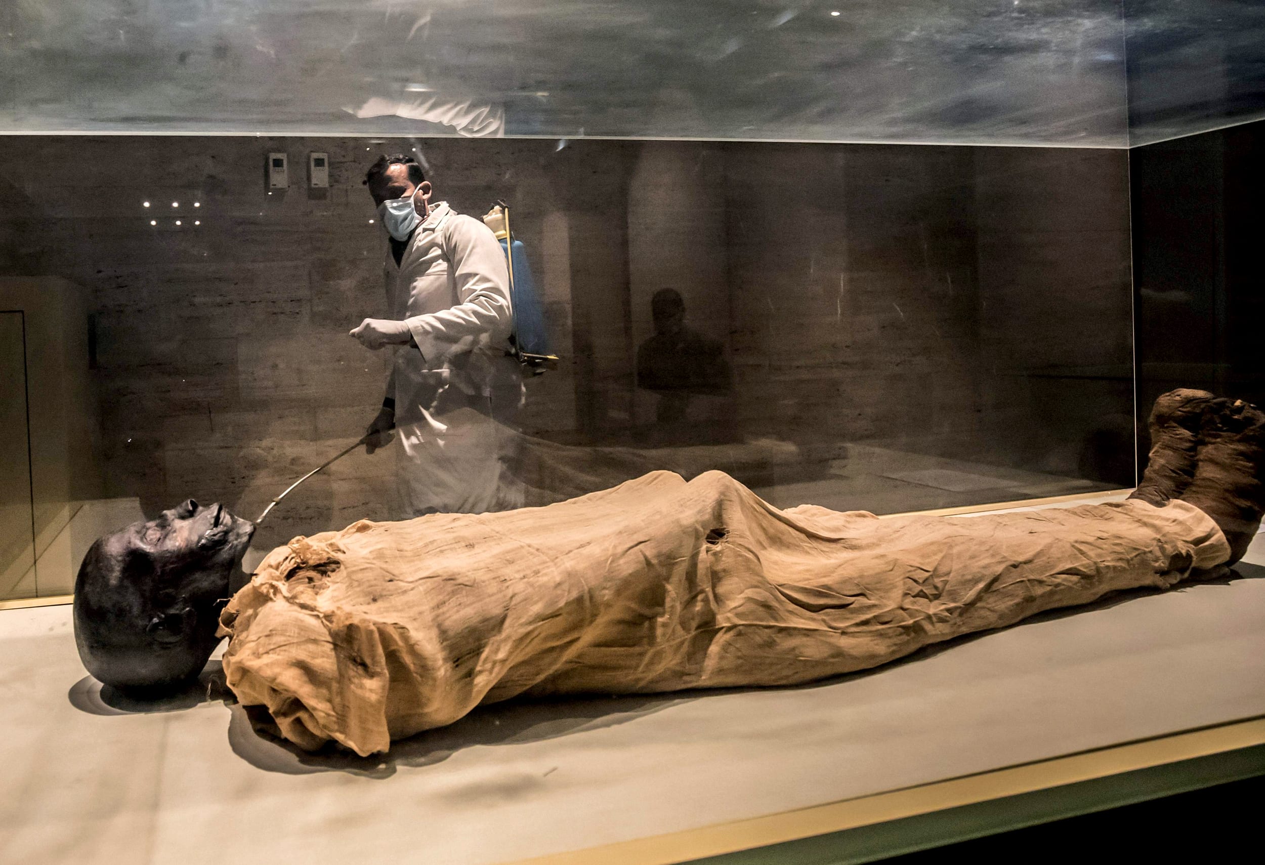 Image: A worker disinfects the Royal Mummies Hall at the Egyptian Museum in Cairo on March 23, 2020.