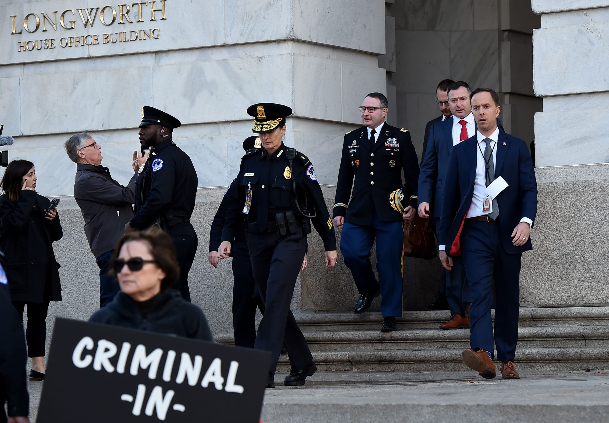 National Security Council Ukraine expert Lieutenant Colonel Alexander Vindman leaves the Longworth building after testifying during the House Intelligence Committee hearing on Nov. 19, 2019.