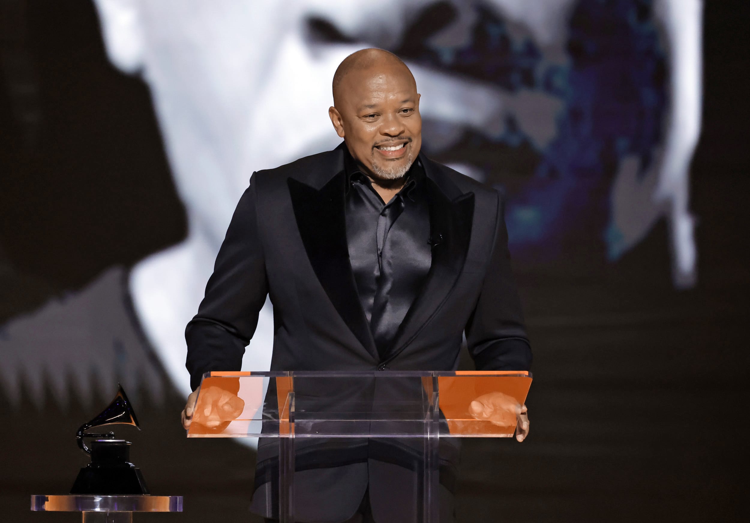 Dr. Dre accepts the Dr. Dre Global Impact Award. 