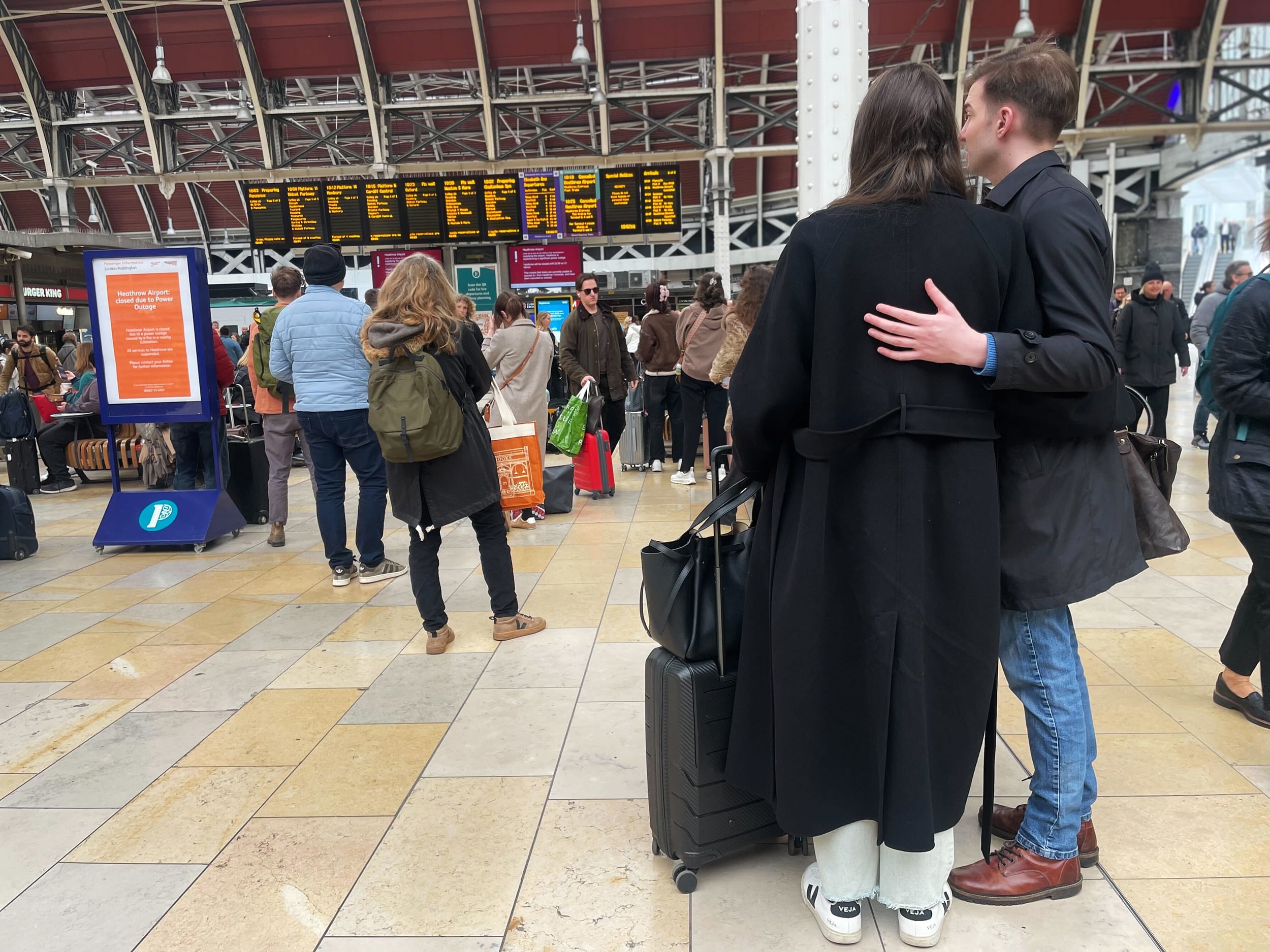 Rail passengers at London's Paddington station on March 21, 2025.