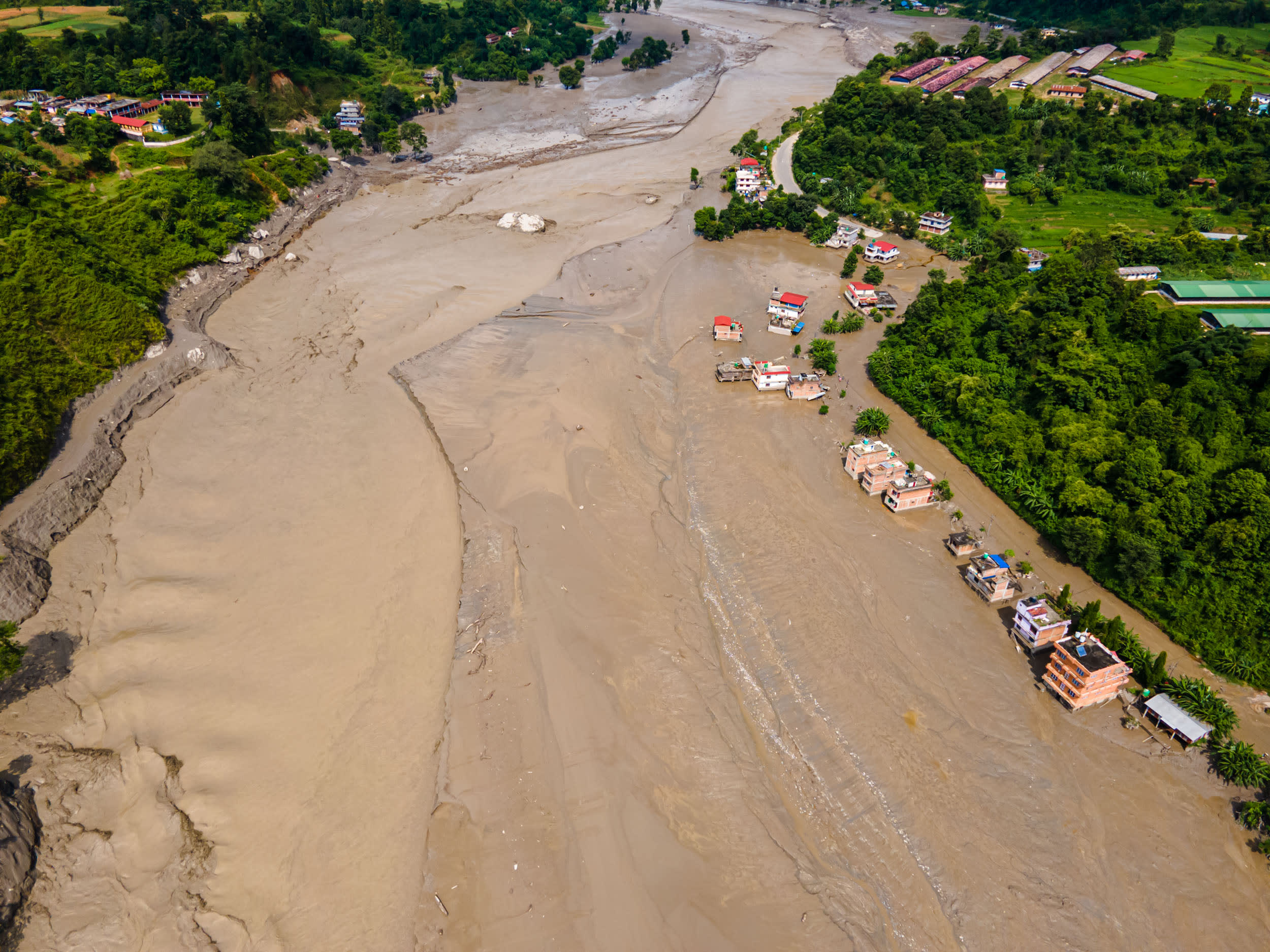 Drone View Shows Bhotekoshi Flood Damage to Homes and Infrastructure in Nuwakot Nepal