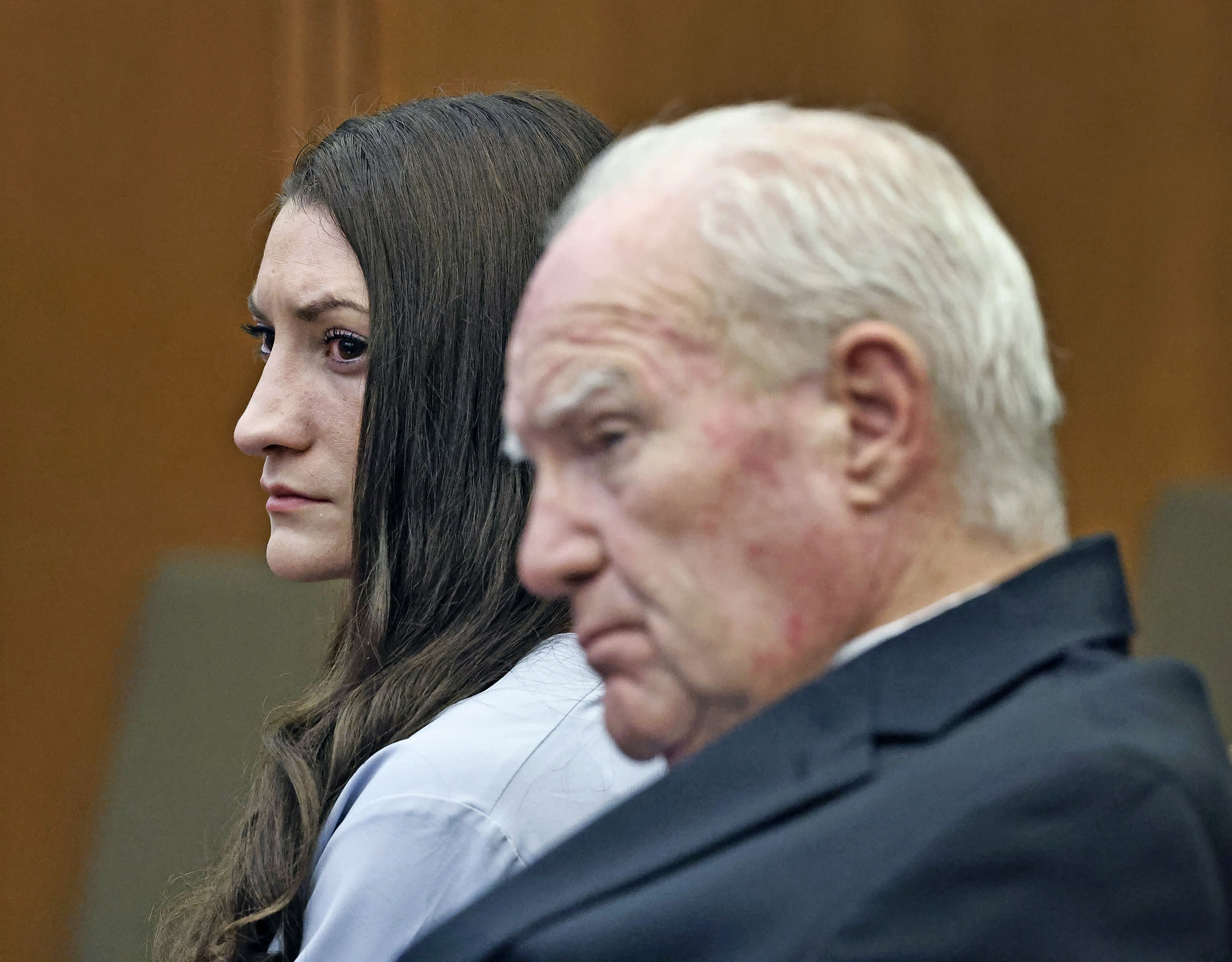 Lindsay Clancy and her attorney Kevin Reddington listen to the closing arguments by Jennifer Sprague.
