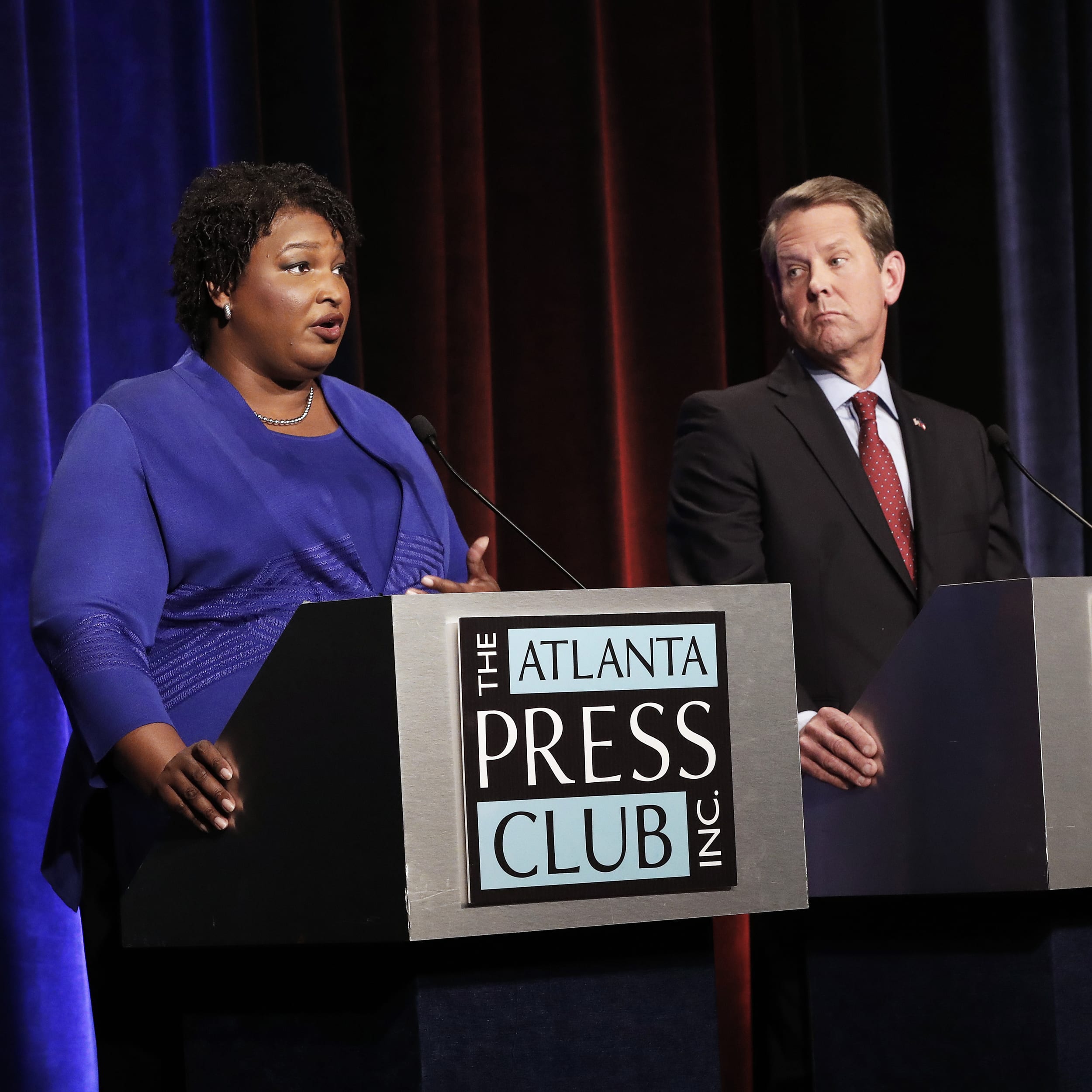 Georgia gubernatorial candidates Democrat Stacey Abrams and Republican Brian Kemp participate in a debate in Atlanta October 23, 2018.