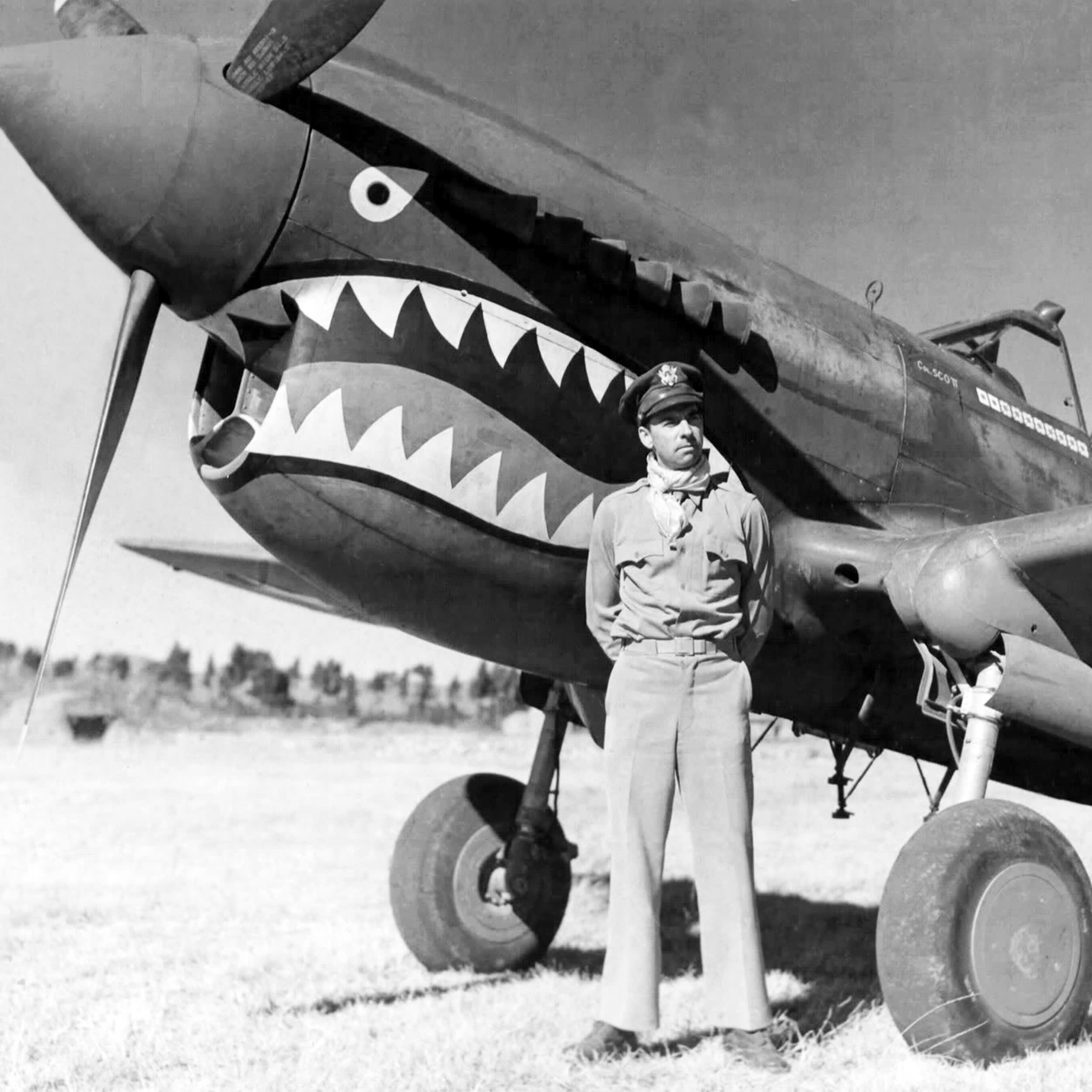 China: Flying Tiger pilot and brigadier general in the United States Air Force Robert Lee Scott Jr. (1908-2006), standing beside his Curtiss P-40 Warhawk, Kunming, 1943