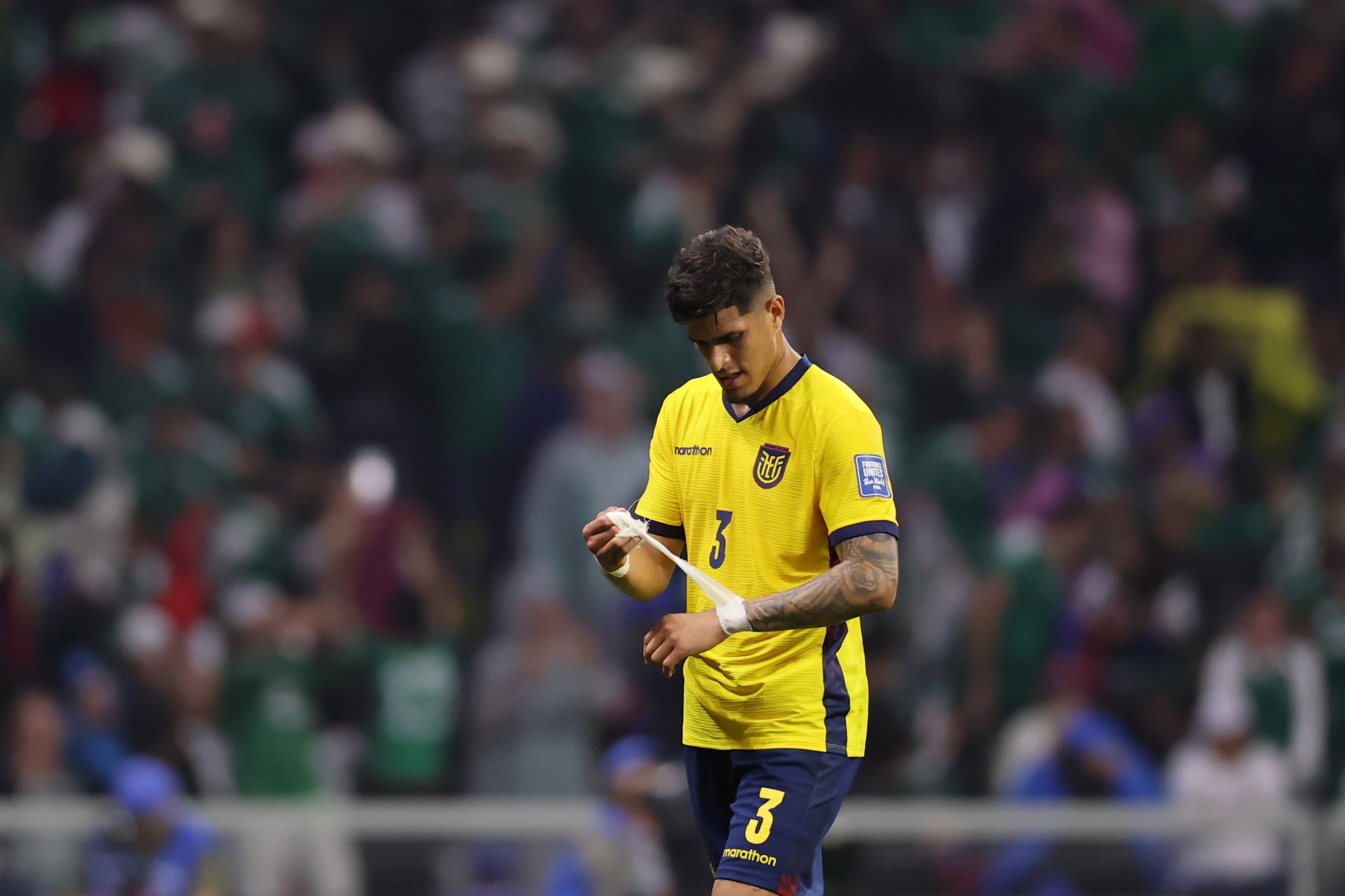 Piero Hincapié #3 of Ecuador reacts as he leaves the pitch after being shown a red card during the match between Mexico v Ecuador.