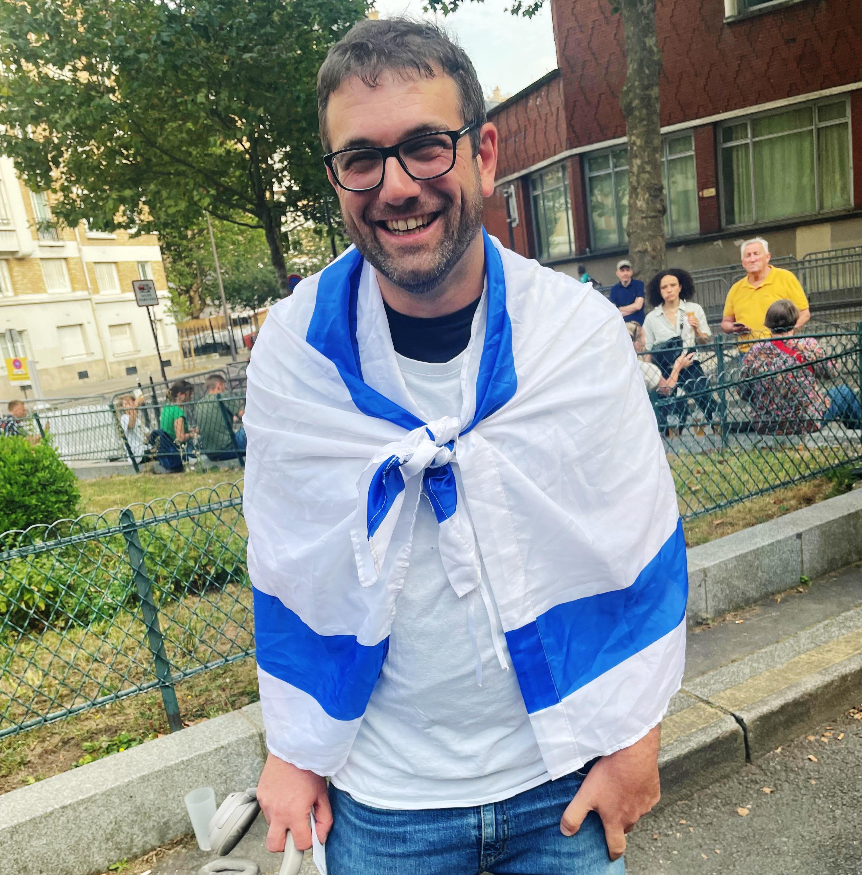 David Gill wears an Israeli flag at the Olympics in Paris on July 24, 2024.