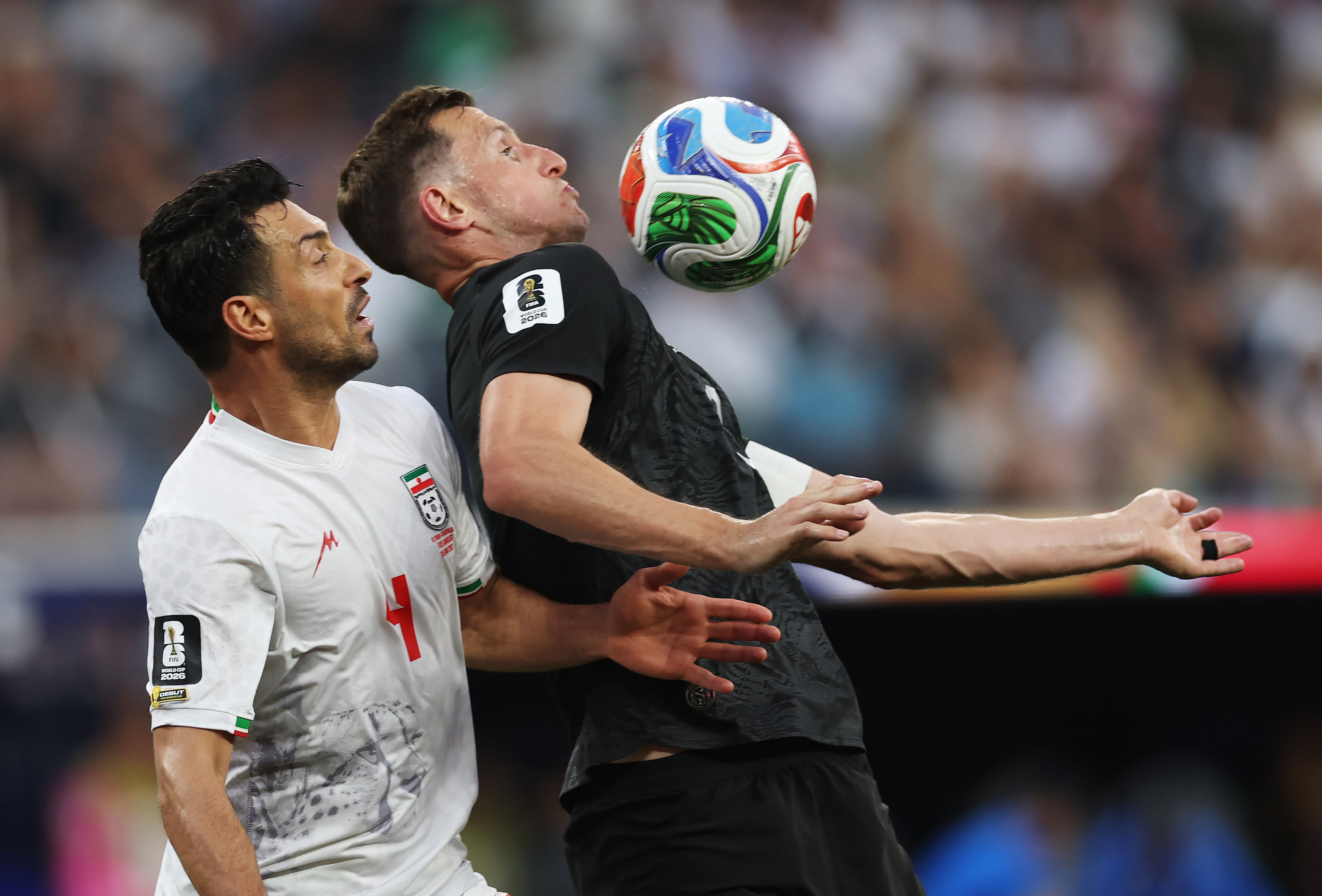 Iran ties with New Zealand after U.S. peace deal in a day of surprise World Cup draws