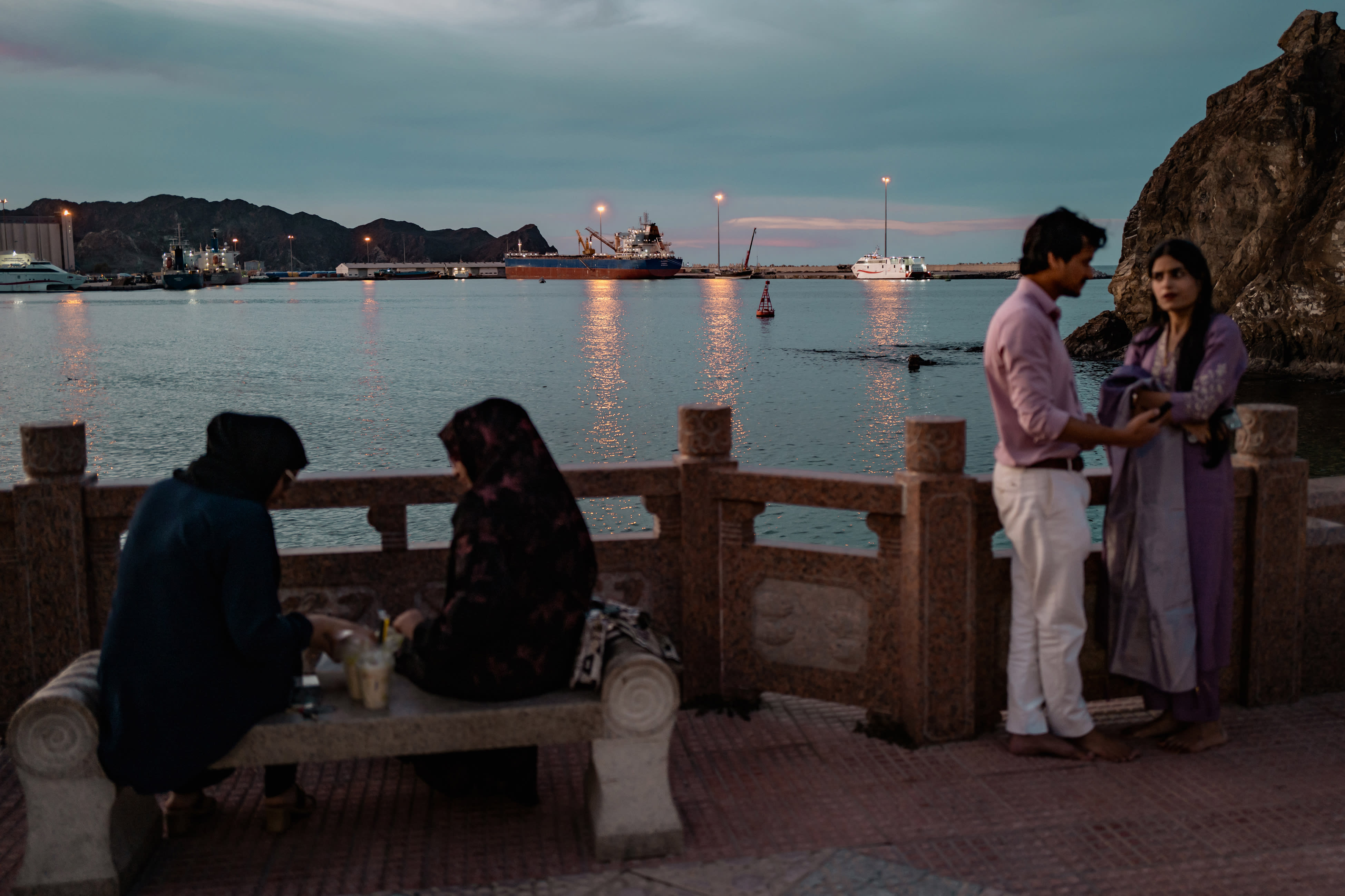 Oil tankers and high speed crafts sit anchored at Muscat Anchorage near the Strait of Hormuz