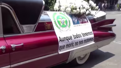 Hearses, songs and drones: How Colombian police get the coronavirus message across