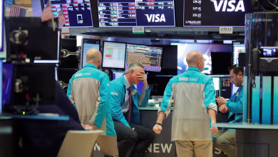 Stocks slide lower as investors wrap up a week of wild swings