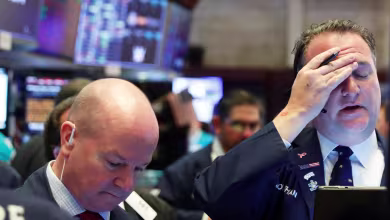 Dow closes at 1,300 point loss despite White House trillion-dollar stimulus plan