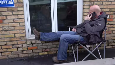 Photo of man visiting his father through window goes viral