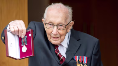 Fundraiser Capt. Tom gets honorary promotion, flyover on 100th birthday