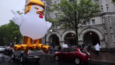 Protesters block traffic in front of Trump's hotel